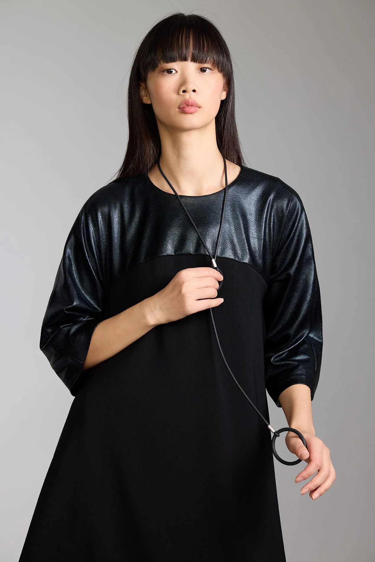 Look21-Shot24-7_YokeDress_CrepeBlendLowerwithBlackFauxLeatherTop_kottkomm_circlecollection.jpg