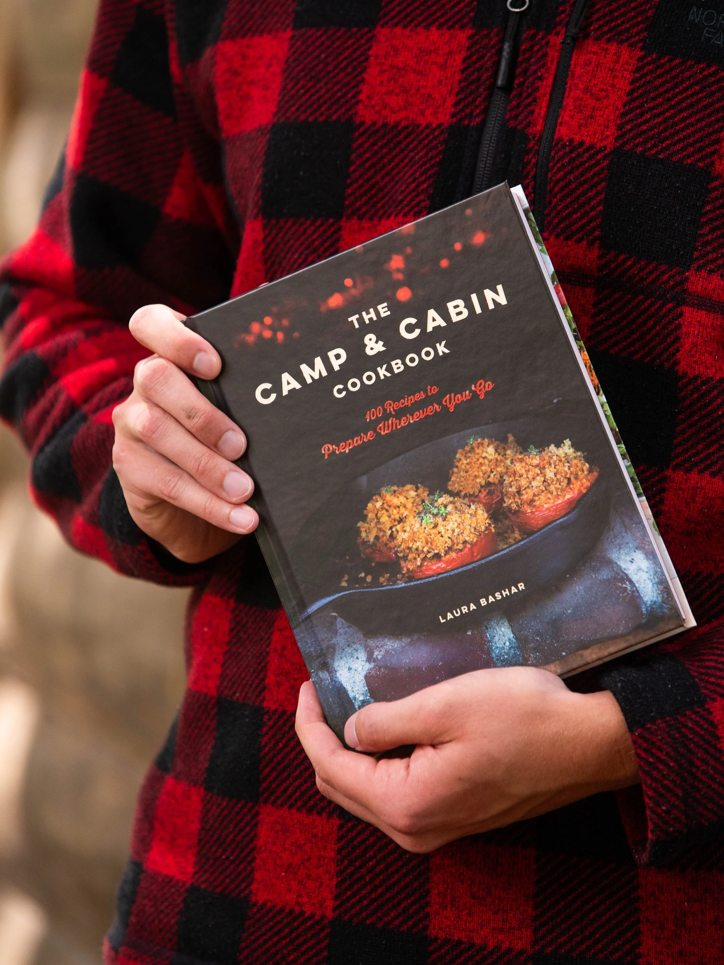 You don&rsquo;t need to travel to get the cozy cabin vibes! Light this hand-poured Cabin Up North Candle and start planning your next outdoor meal with The Camp &amp; Cabin Cookbook! Find more in stores now. 🌲💚
