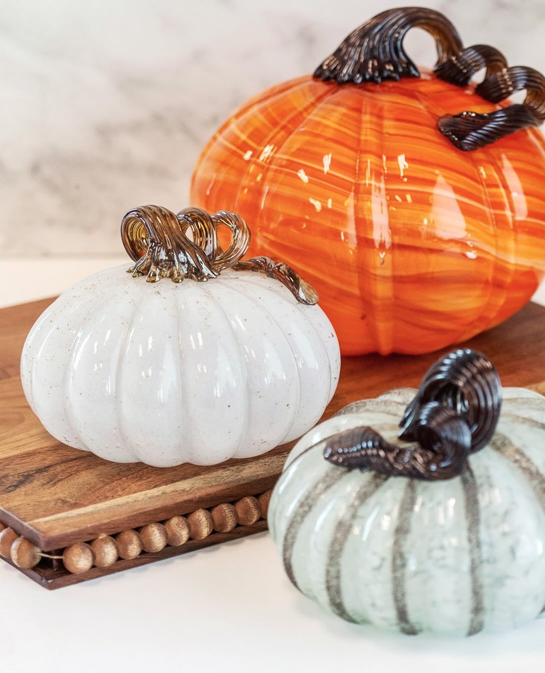Fall decor done right 🎃 Stop by today to grab these glass pumpkins and finish styling your home for the season!