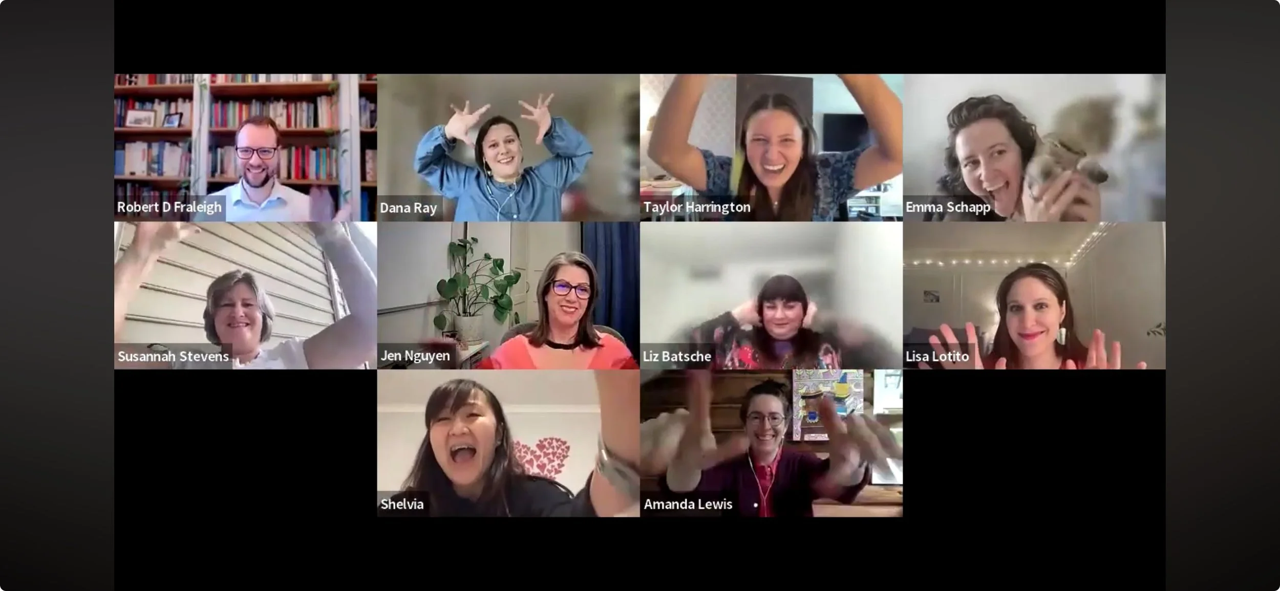 A group gathers on a computer screen in separate squares. They are joyful and are throwing pretend confetti with their fingers.