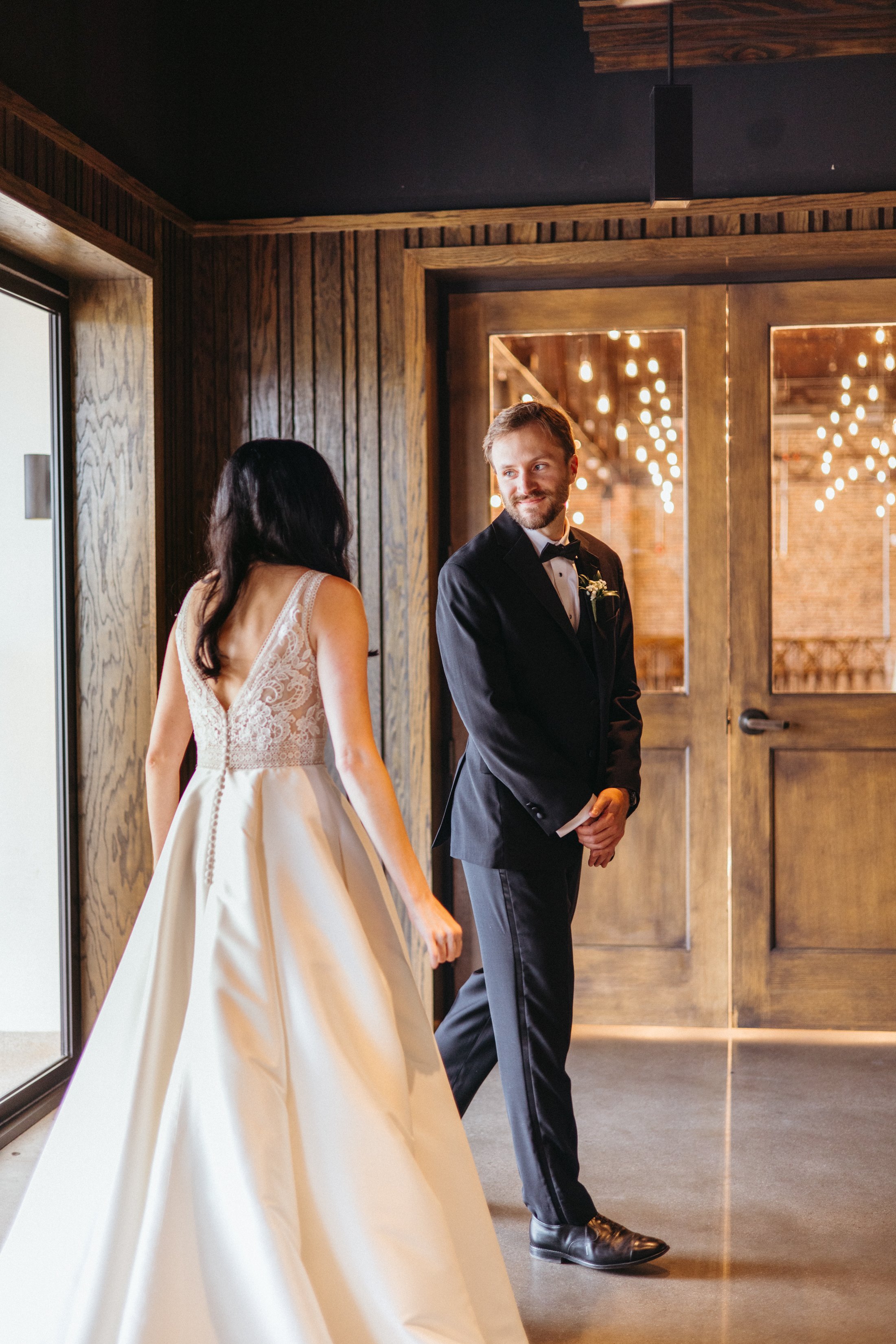 bride and groom first look photo at downtown Knoxville tn wedding at the press room