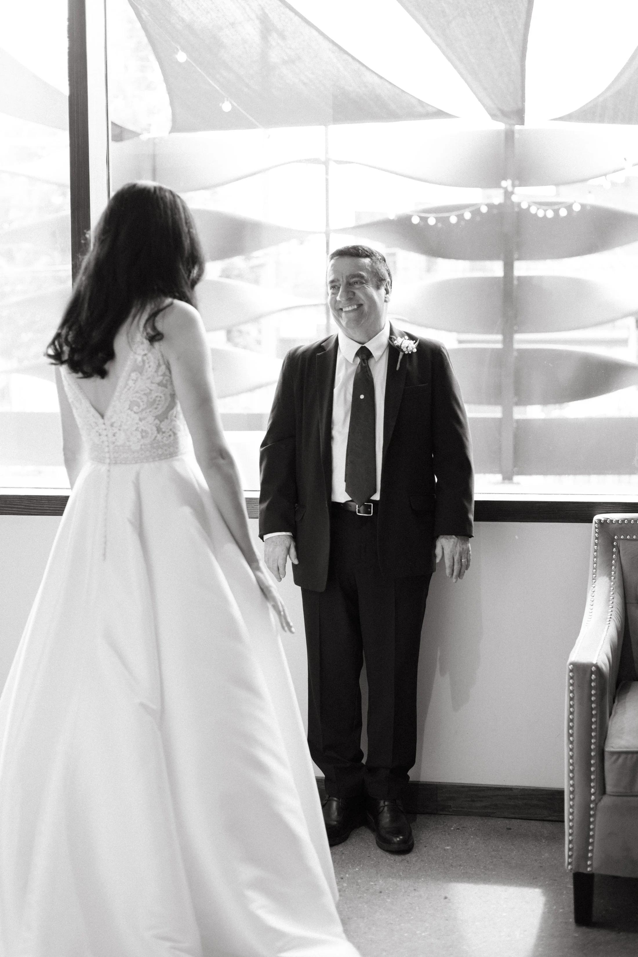 bride and father first look photo at downtown Knoxville tn wedding at the press room