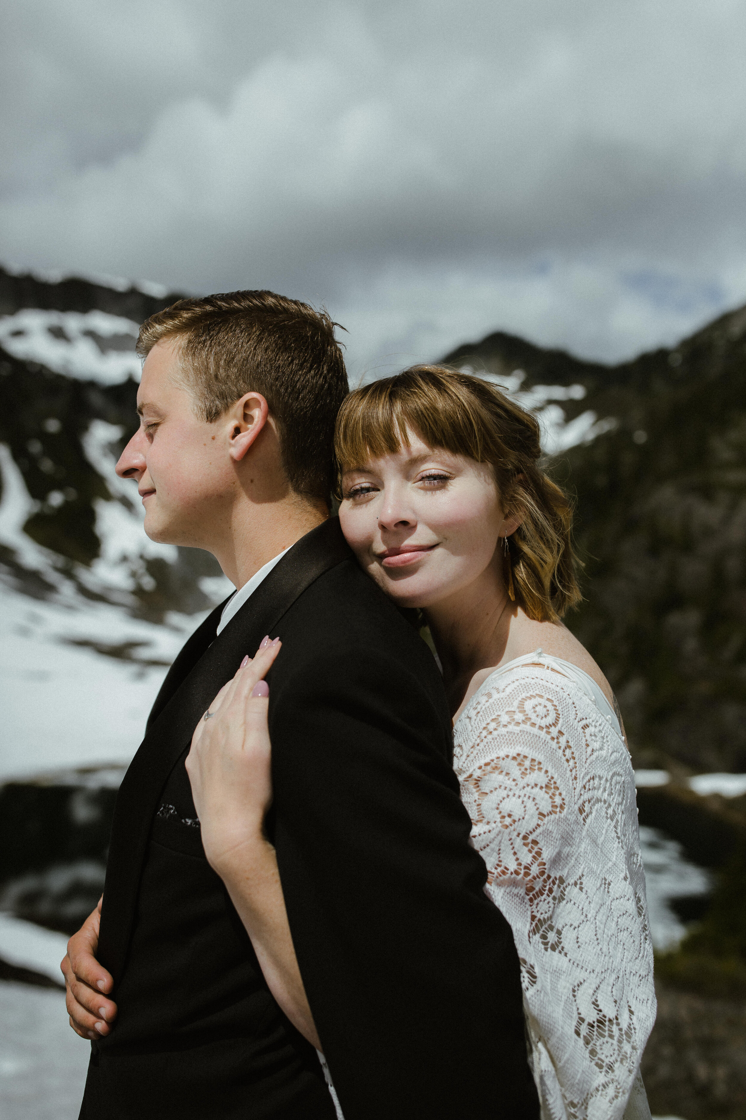 A portrait of a bride and groom married at Mt. Baker in a summer mountain elopement ceremony