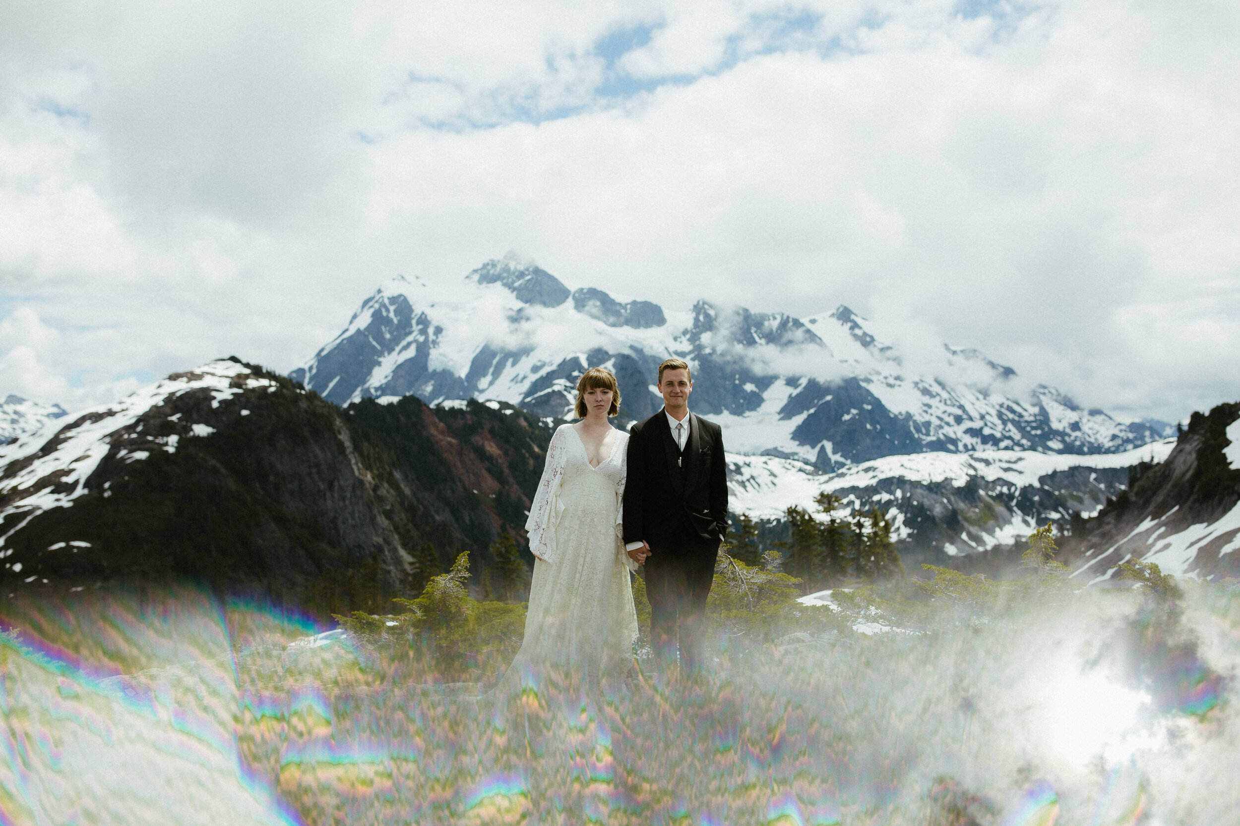 A bride and groom get married at Mt. Baker in a summer mountain elopement ceremony