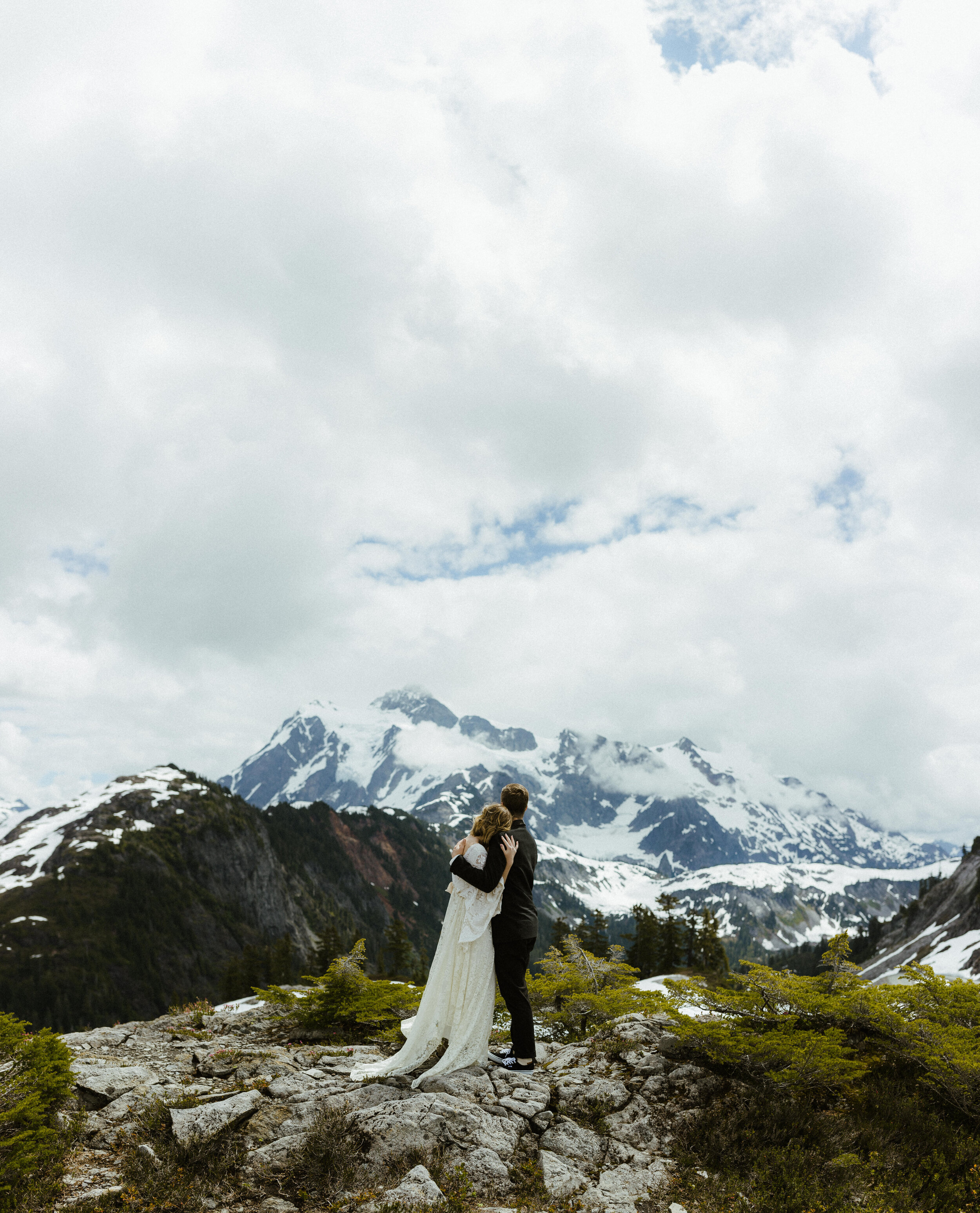 A portrait of a bride and groom married at Mt. Baker in a summer mountain elopement ceremony