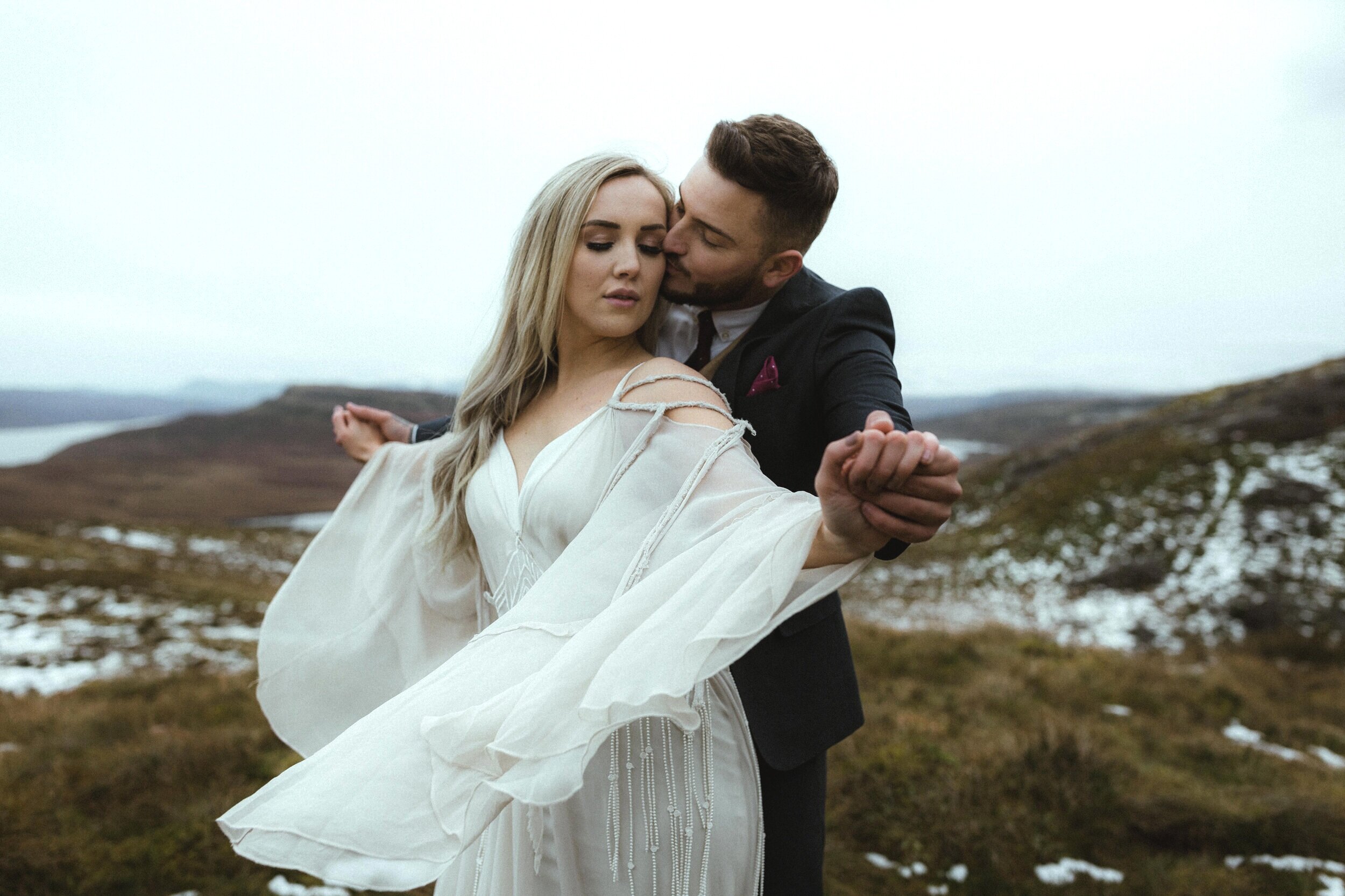 A bride and groom at their Old Man of Storr Quiraing Isle of Skye Scotland elopement