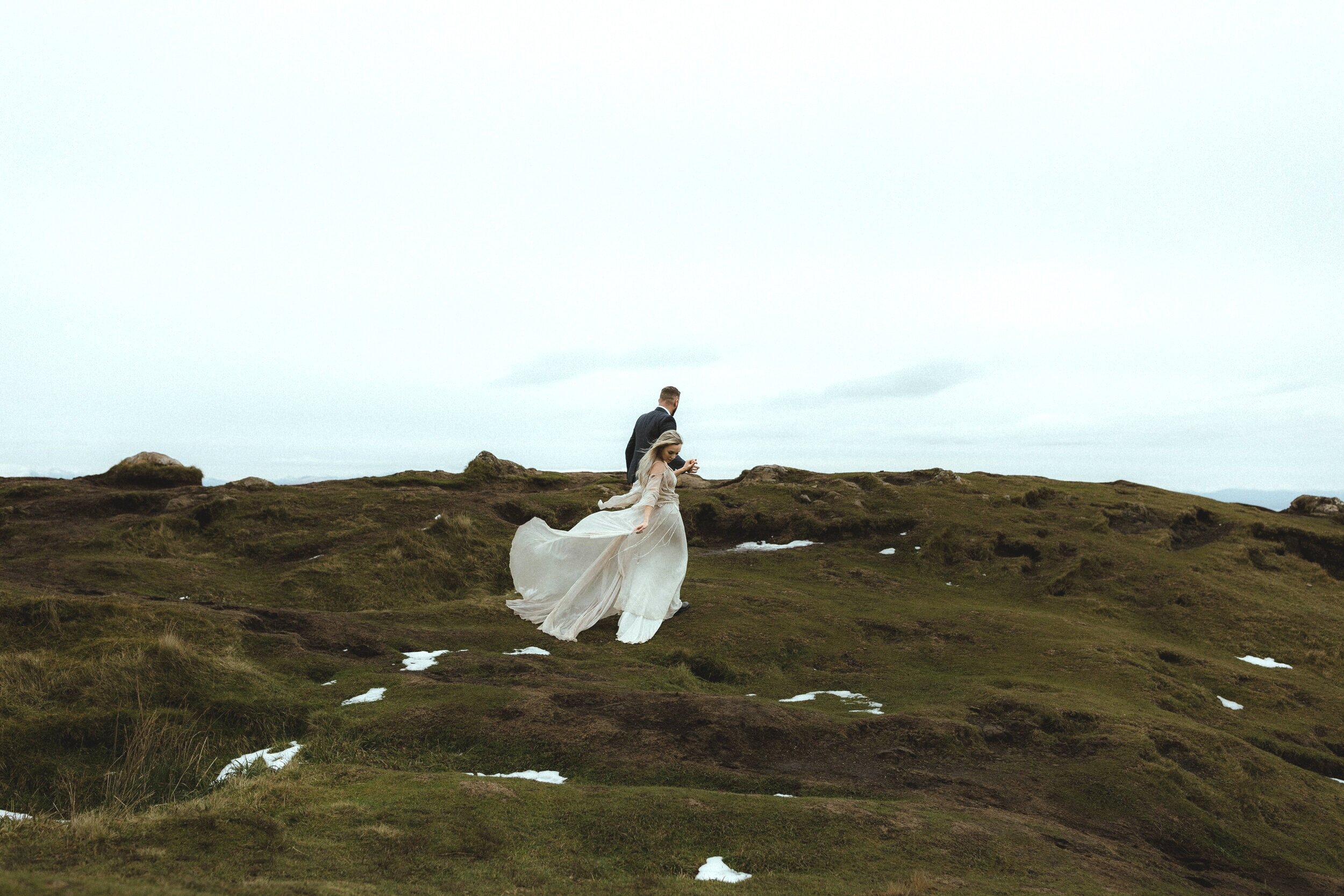 A bride and groom at their Old Man of Storr Quiraing Isle of Skye Scotland elopement