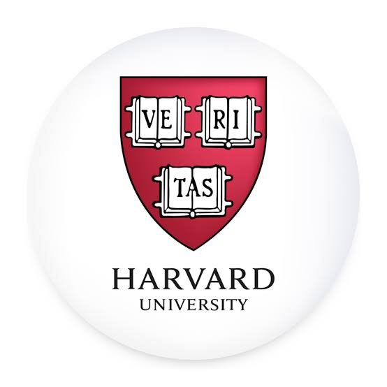 Harvard University shield with the Latin motto 'Veritas' on three open books.