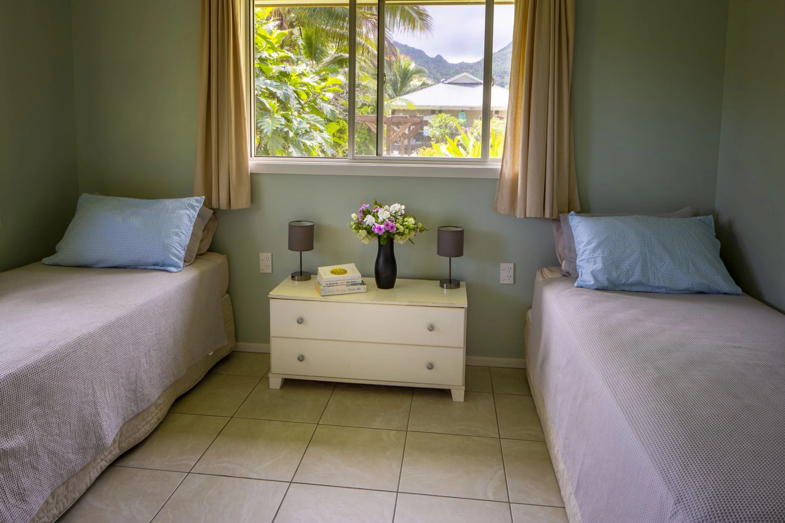 second bedroom with king or two single beds.jpg
