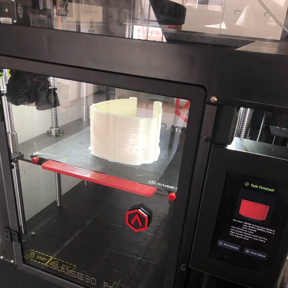 Big stacks of 16 3d  printed face shield frames