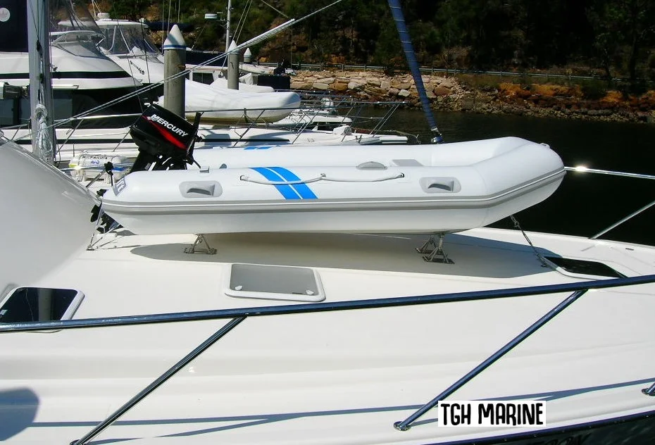 dinghy on deck chocks.JPG