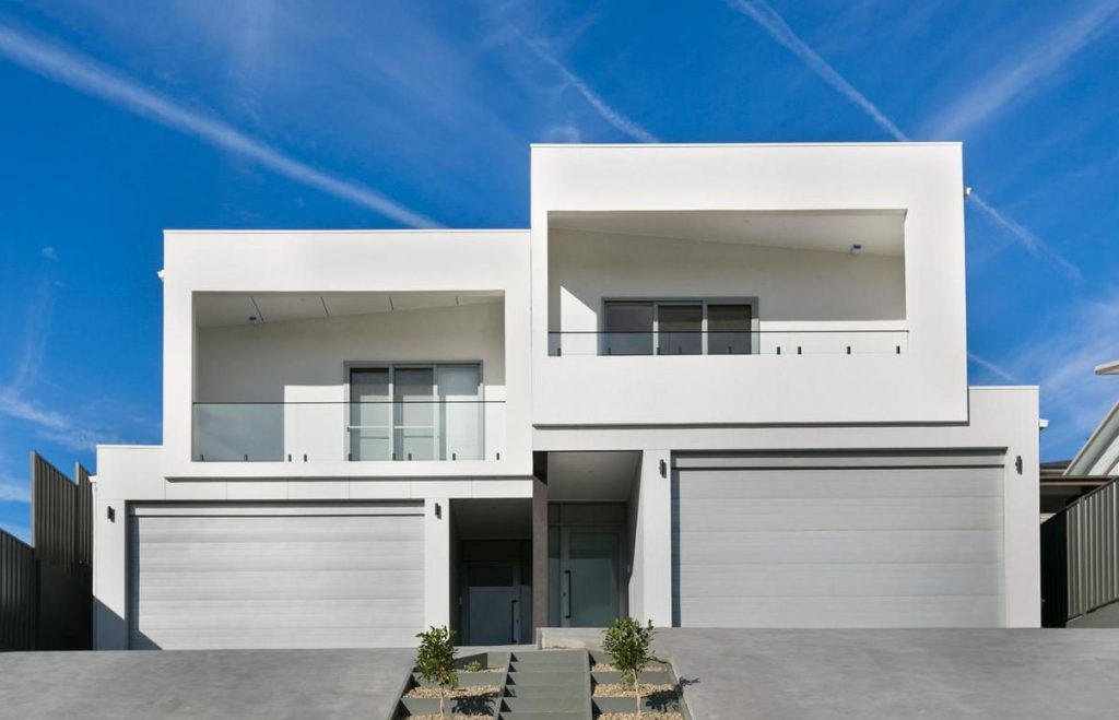 luxury-dualoccupancy-centralcoast-southcoast-architect-accreditedbuildingdesigner-duplex-townhouses-design-modern-contemporary-facade-steep-block-square-building-form-e1530766393430-1024x659.jpg