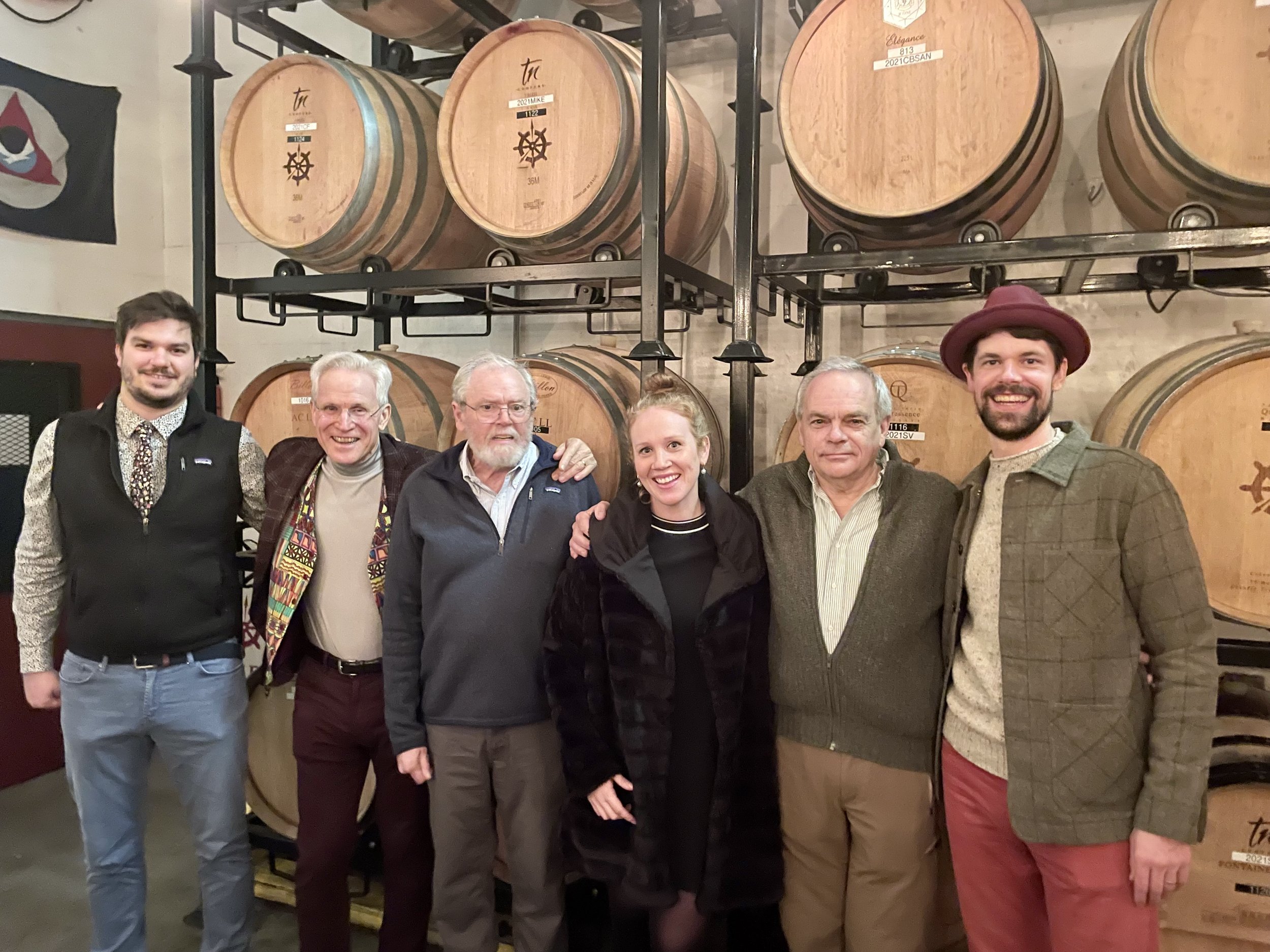 Group of people in the barrel room