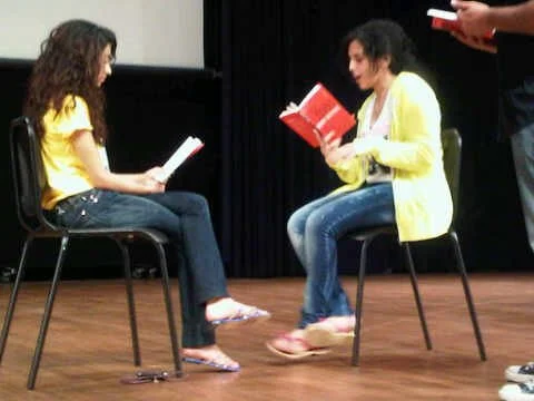 Meera Almidfa as Mrs Lyons, and Maha Dahalan as Mrs Johnstone