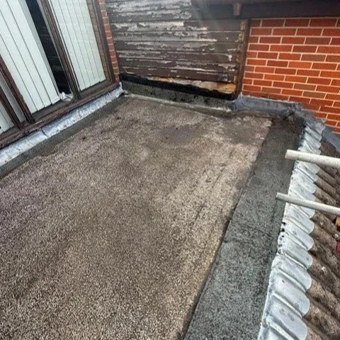 A damaged and old flat roof