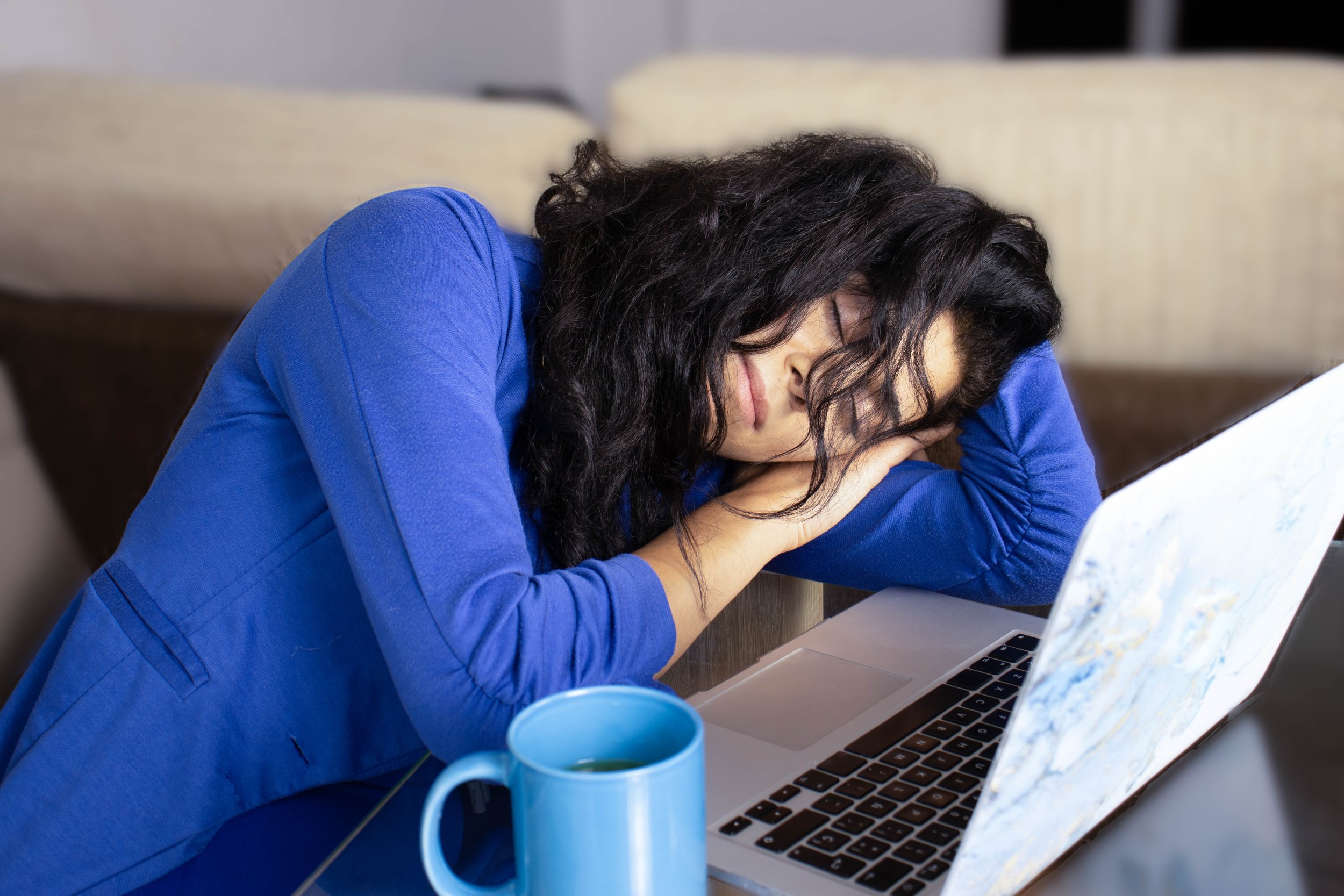 Blue Monday Sad Employee Sitting at Desk