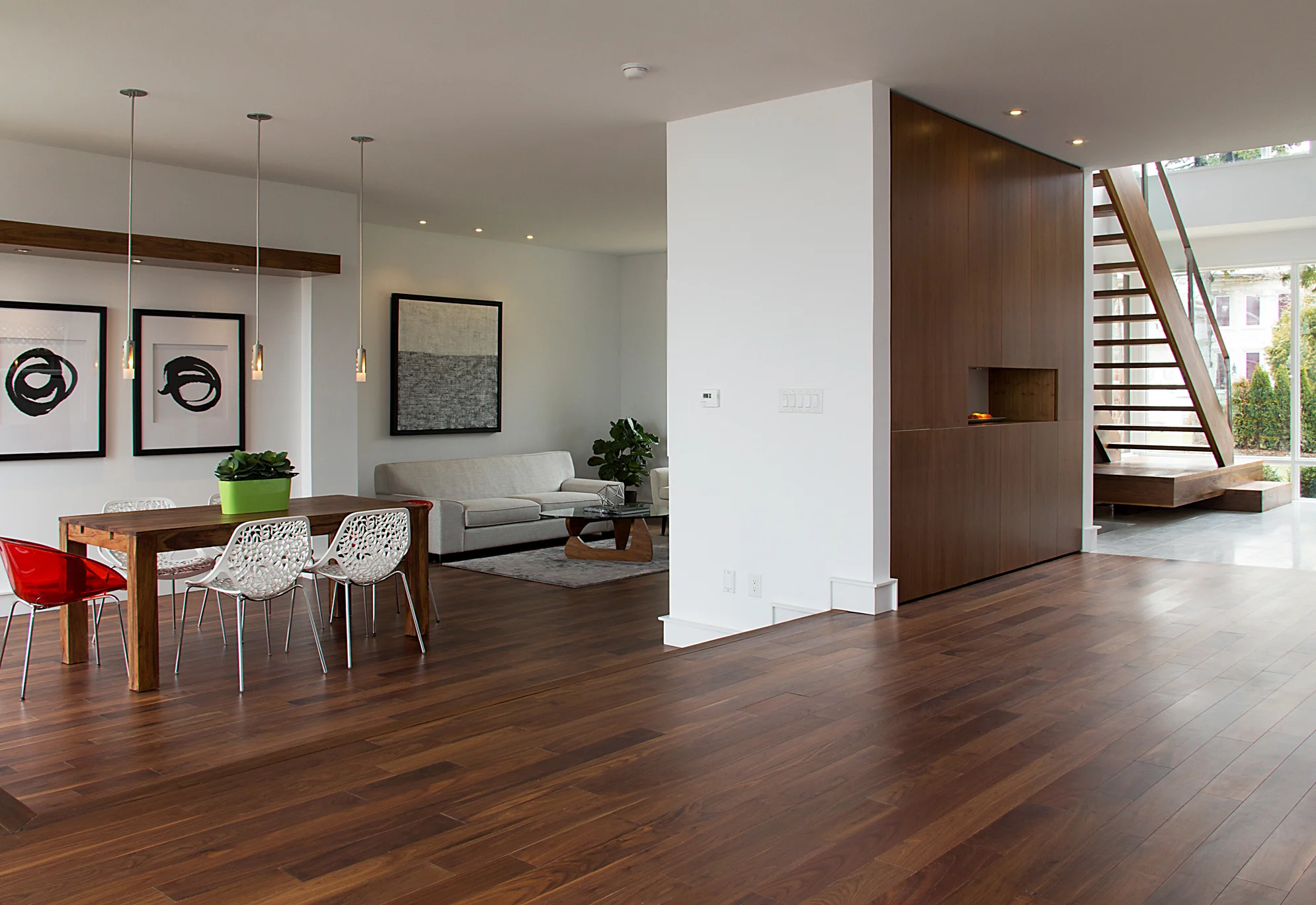 The sunken dining and living areas are distinct spaces from the family room and open kitchen.