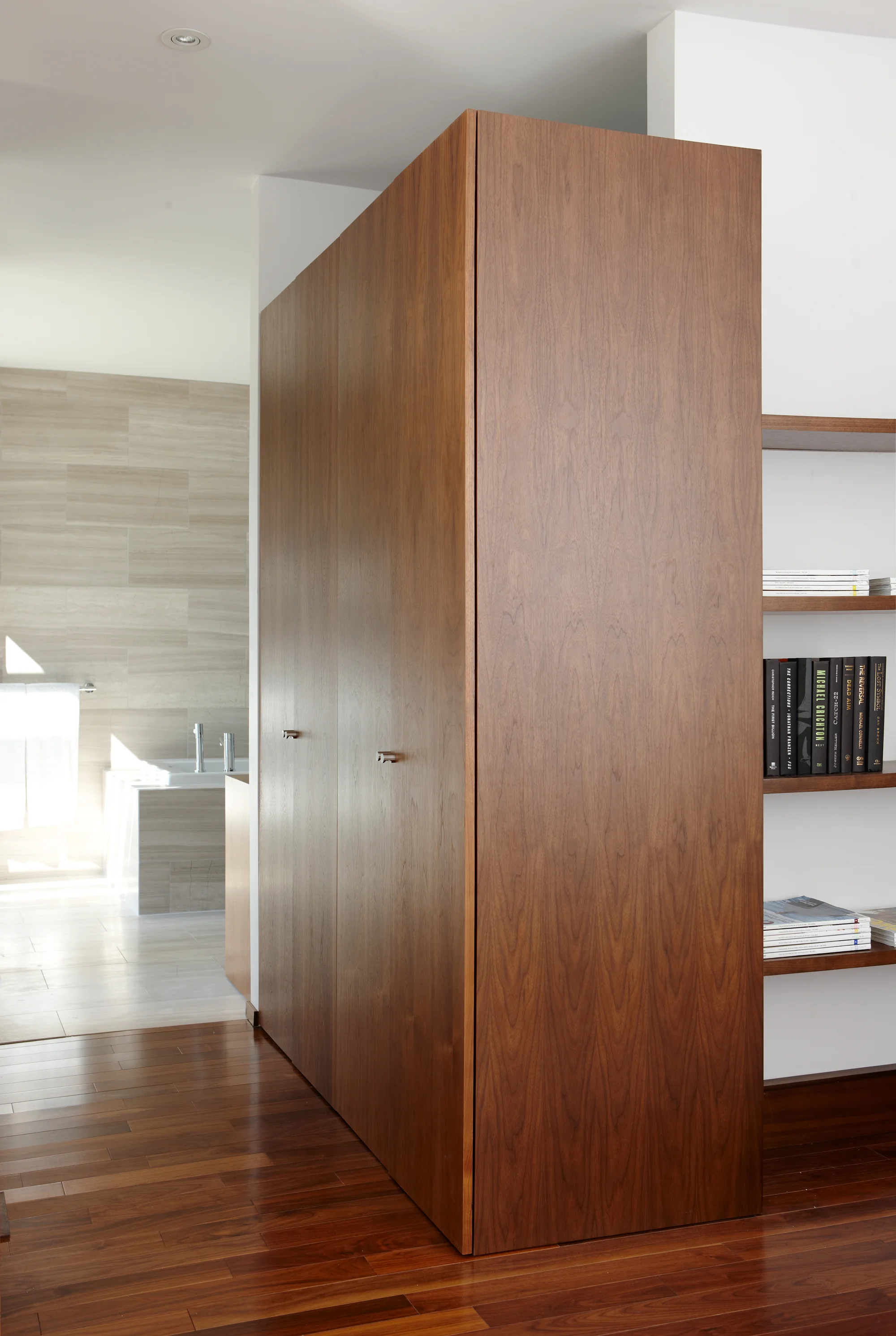 Custom closets and shelving integrate seamlessly with the surrounding architecture.
