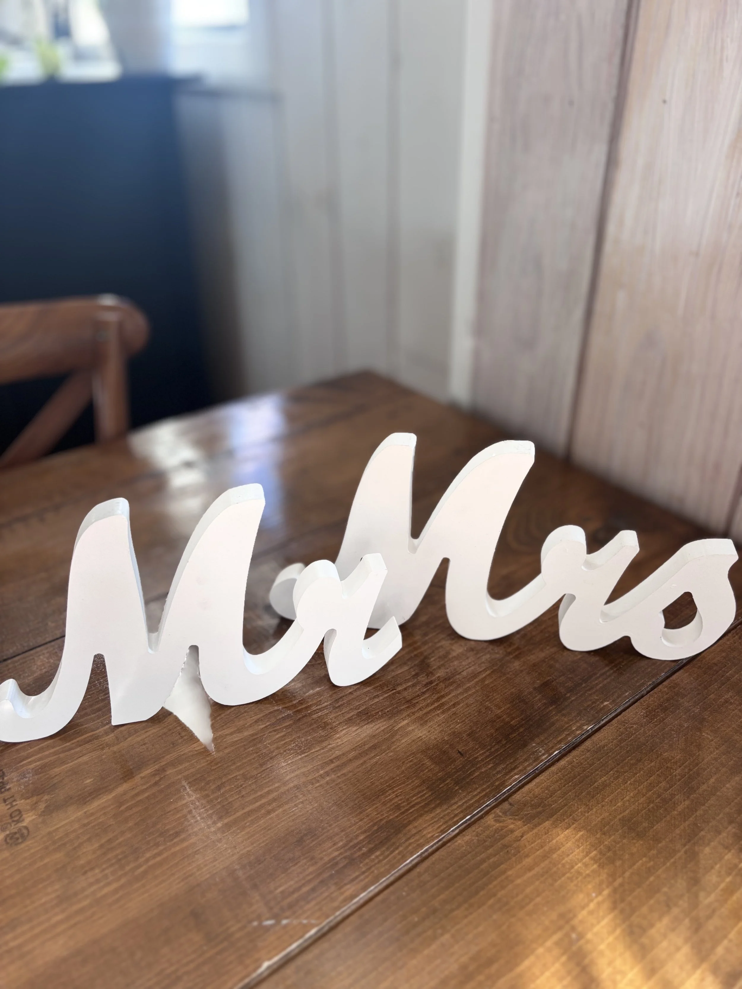 White "Mr. & Mrs." Wooden Signage