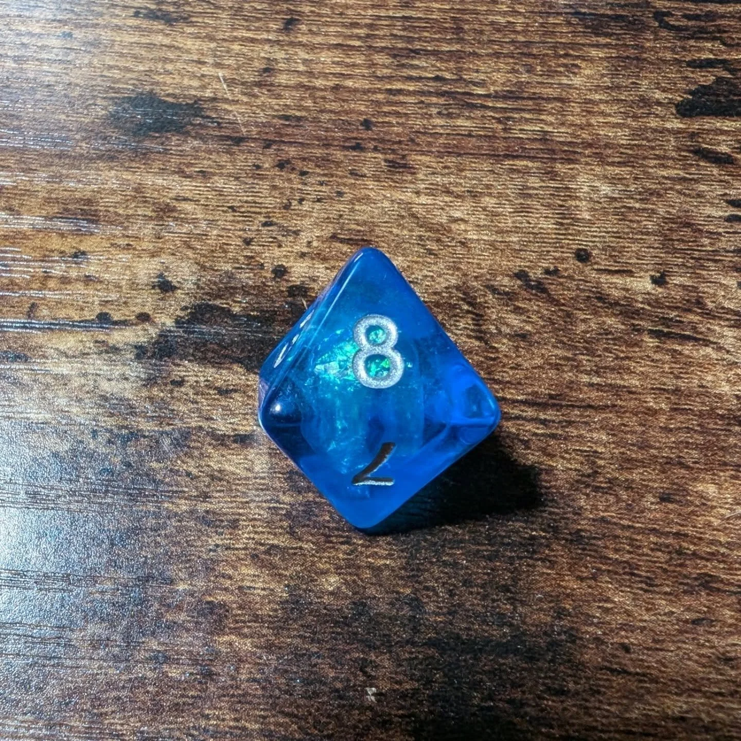 And now for tonight's #day2 #diceadventcalendar reveals. We had an icy blue d8 from @fanrolldice which was awesome. From @adventuredice the d12 that matches yesterday's d20 with the northern lights vibes- love that blue sparkle. The Amazon calendar r