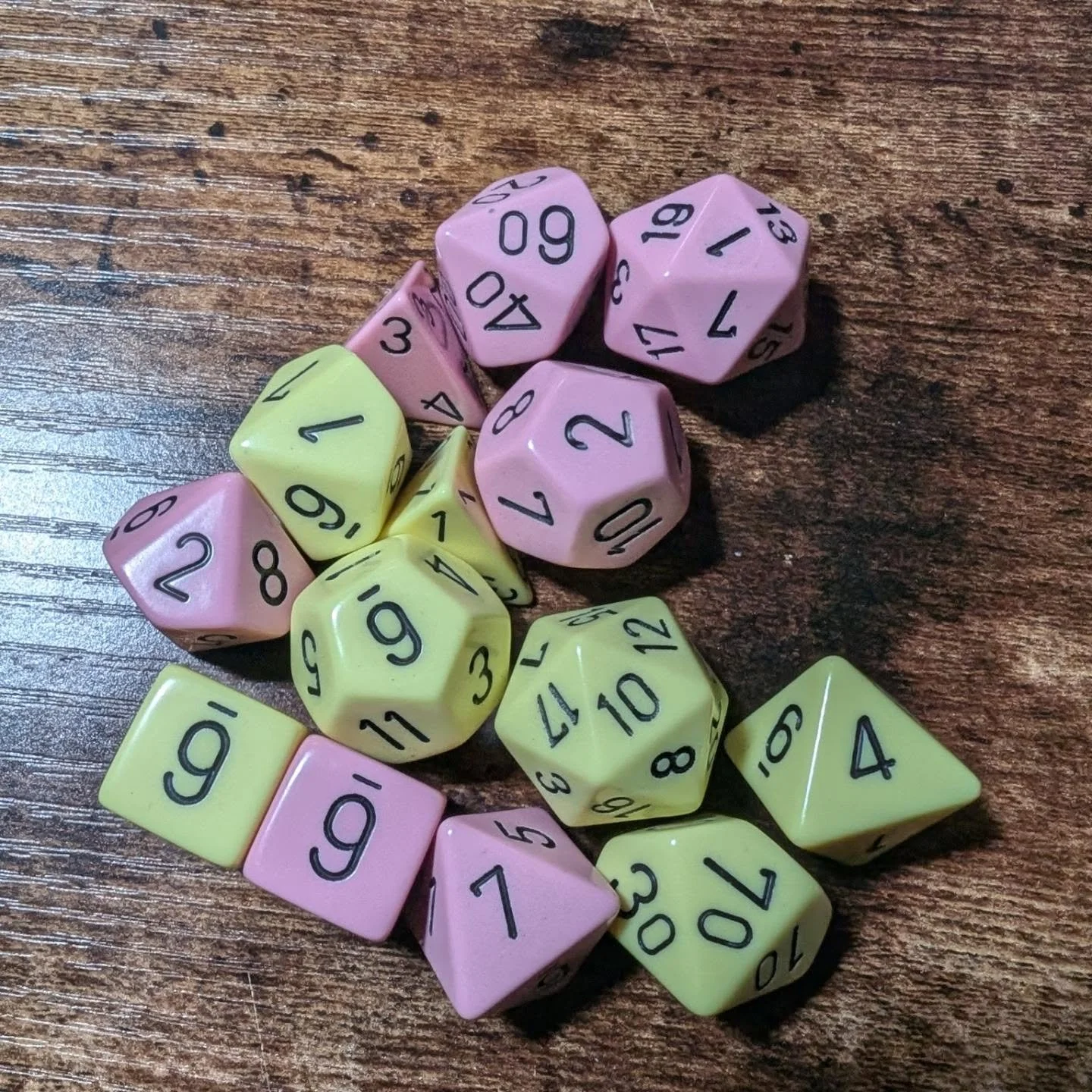 Here are the #dice that we looked at on this week's episode of #DiceDive - We have Opaque Pastel Pink and Opaque Pastel Yellow from @chessexdice which are lovely. We have OOP Framed Void with Copper Numbers from @fanrolldice  which are so beautiful a