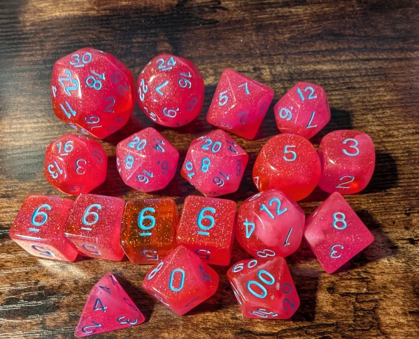 My first ever completely custom dice! This beautiful set of glittery pink amazement comes from Inked Curations. The creator was a dream to work with and made sure that everything was just right at each step along the way! They are gorgeous and roll s