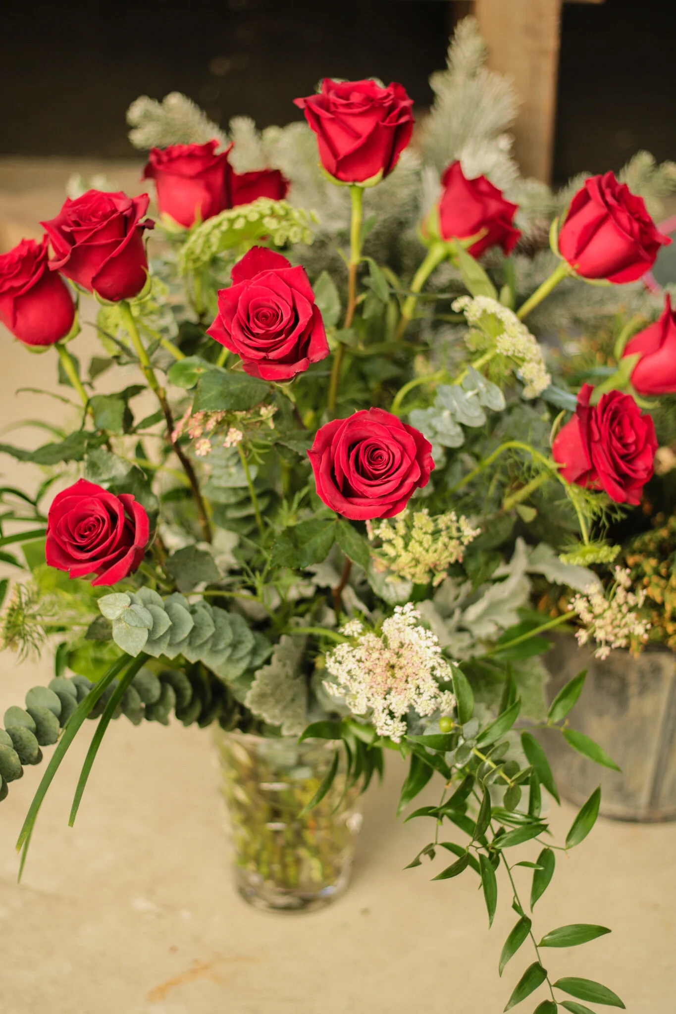 Dozen Roses with Assorted Greens