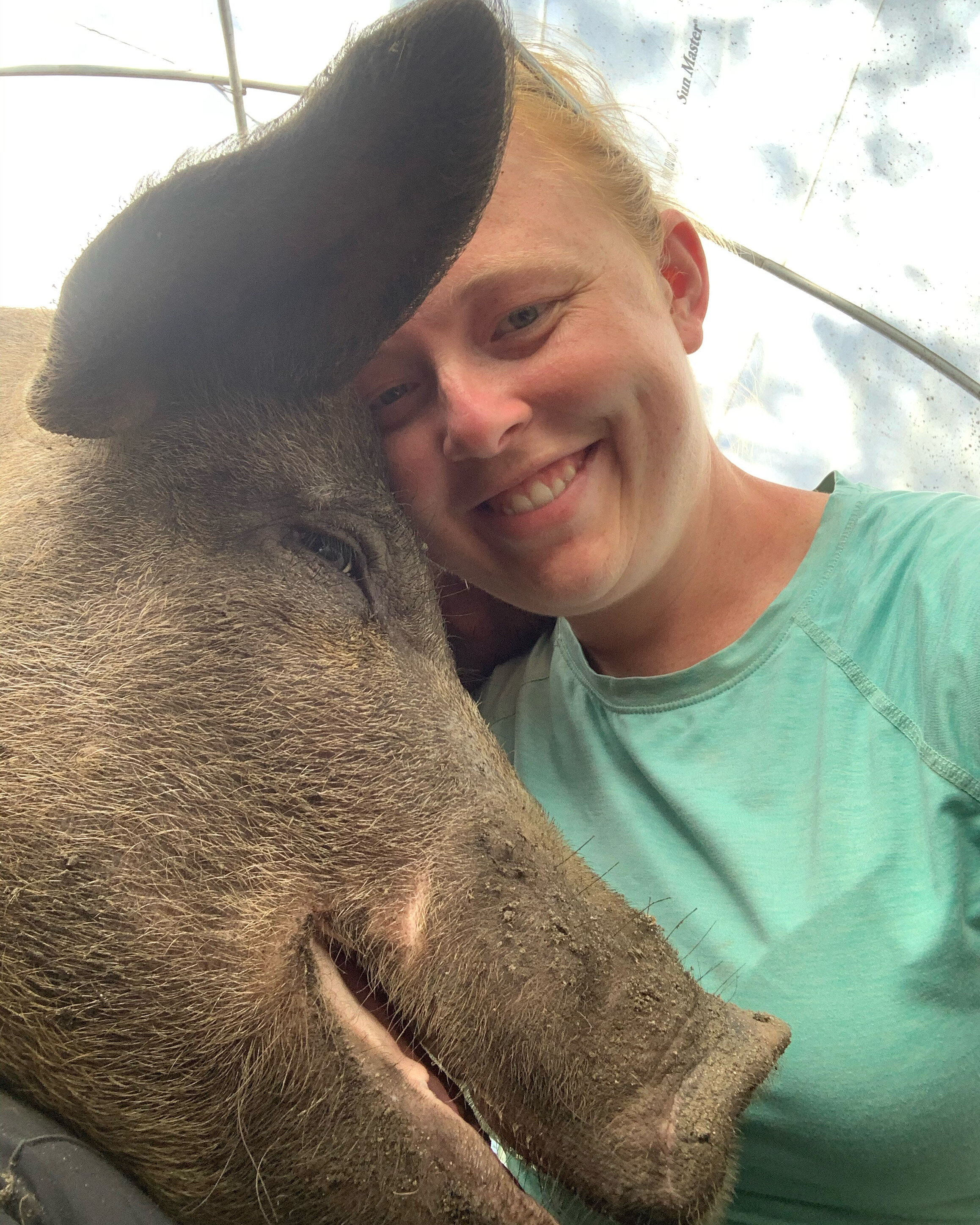 Kate and sow farrowing hoophouse.JPG