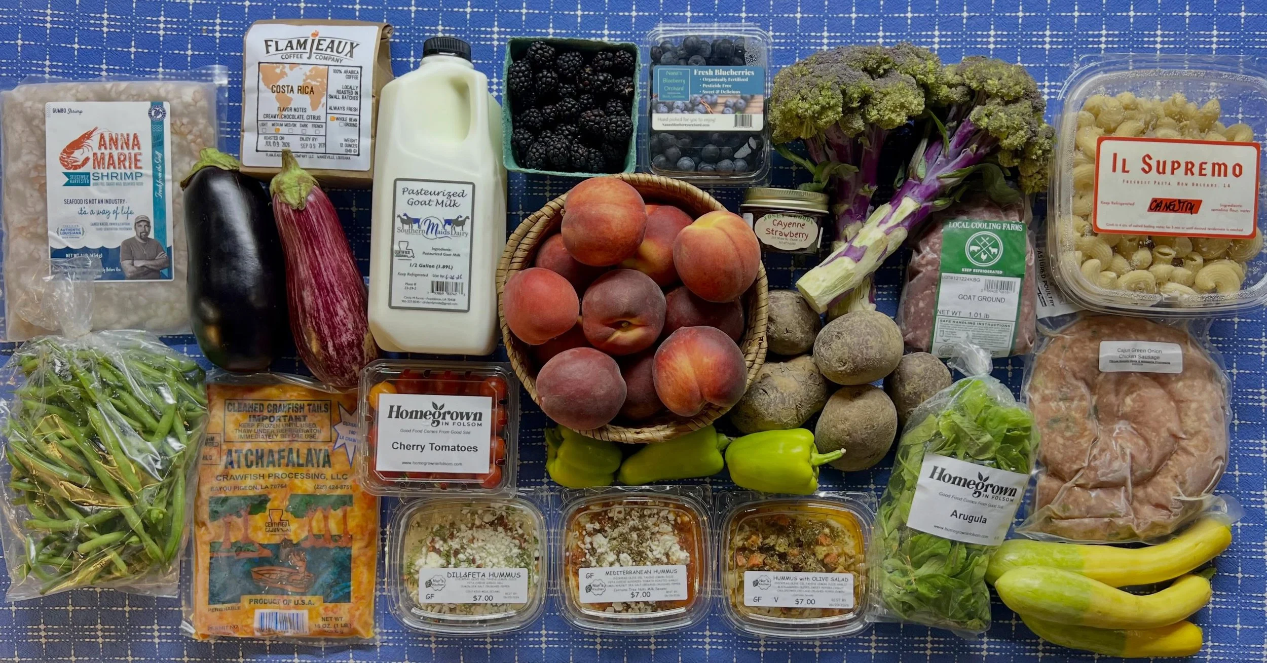 Peaches are back for the weekend!

Plus purple broccoli (and green broccoli, too!), plenty of berries (black and blues!), gorgeous salad greens, eggplant, peppers, squash, green beans, potatoes and tomatoes (plus not pictured root veggies, sweet corn