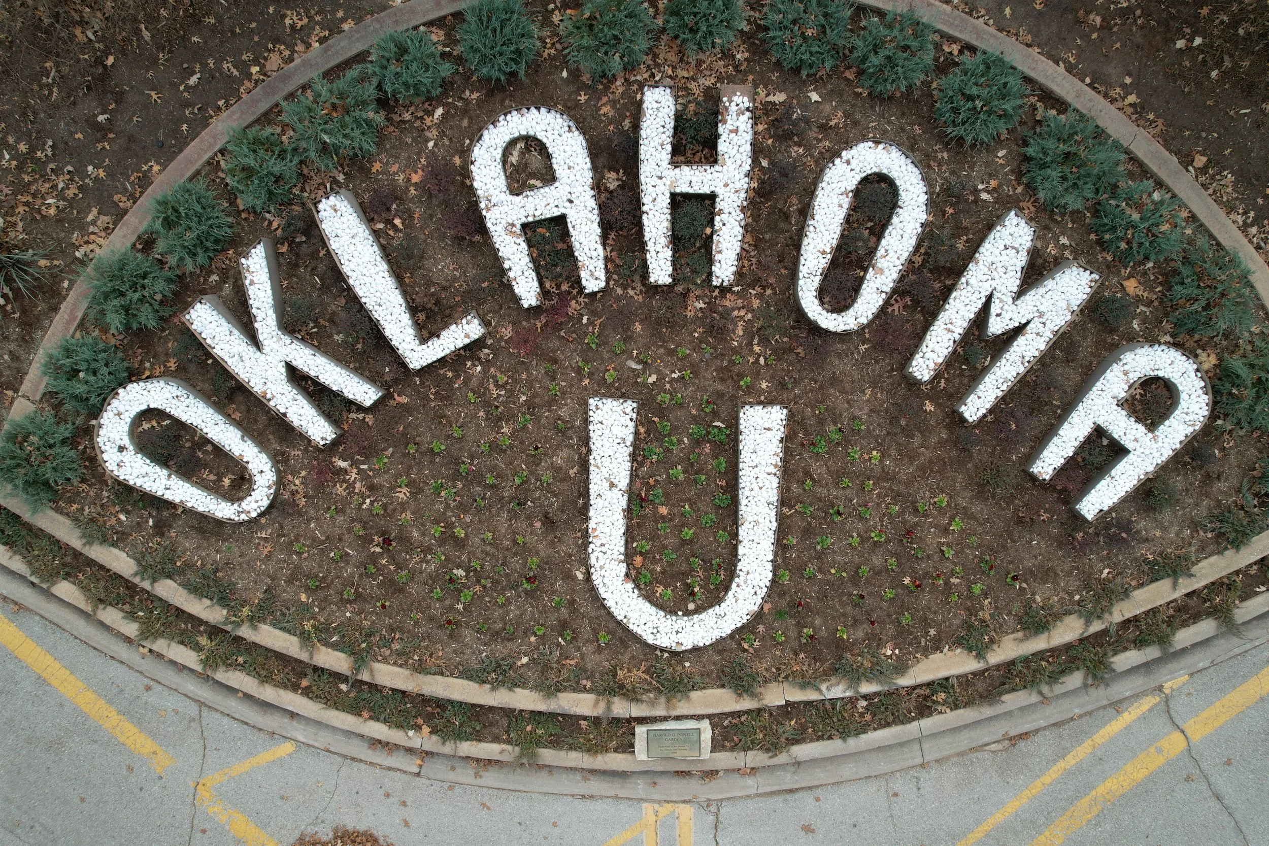  For nearly 50 years, metal edging defined Oklahoma U letters filled with a seasonal rotation of plantings and stone. LAUD used aerial photos to document the existing letter forms. The letters and layout were carefully designed to maintain the spirit