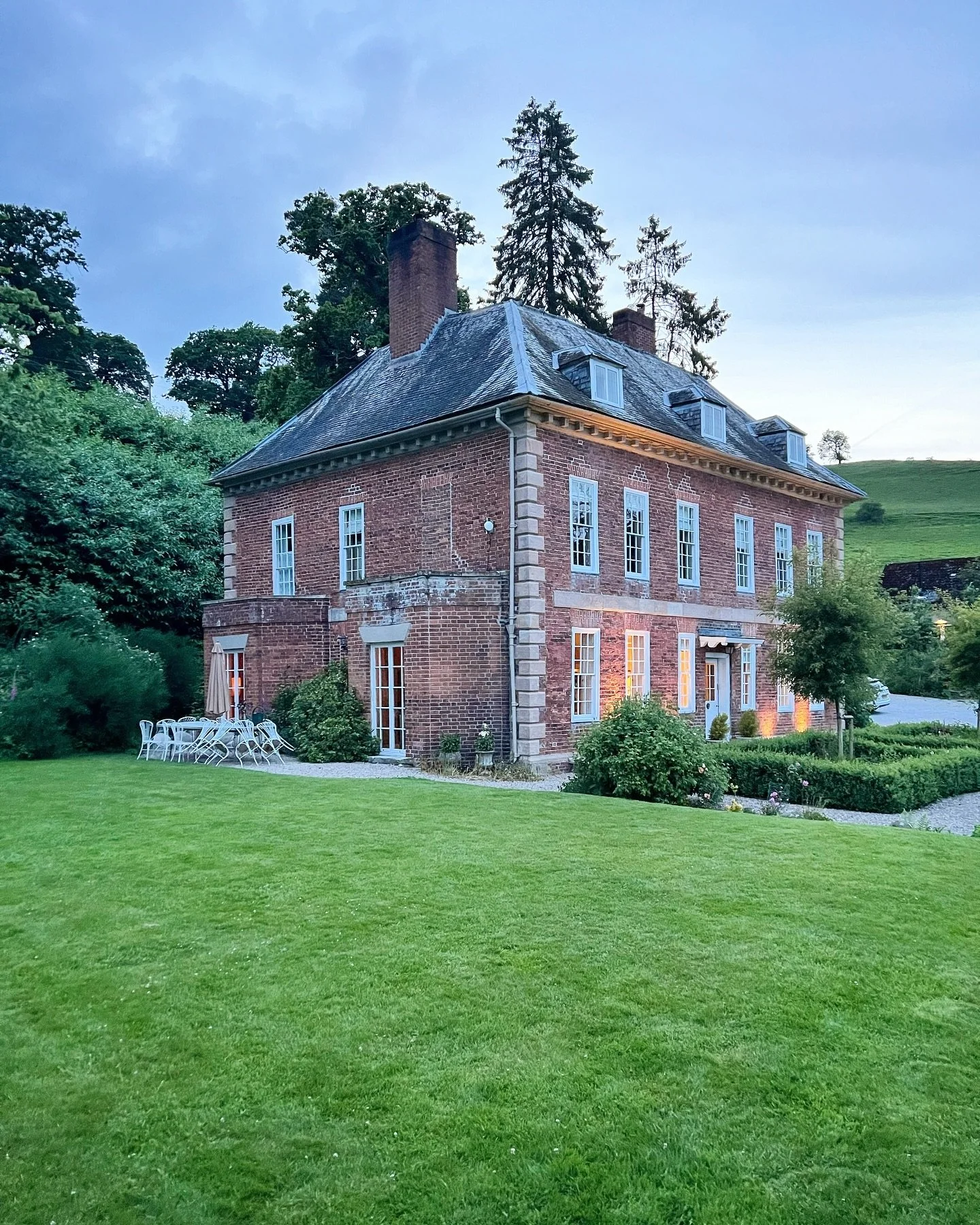 The evening light is my favourite time up here on the hill. 
If you sit quietly you&rsquo;ll see the house martins making their suppertime flights across the lawn, and perhaps the kites circling above the fields looking for mice. 
If you want to take