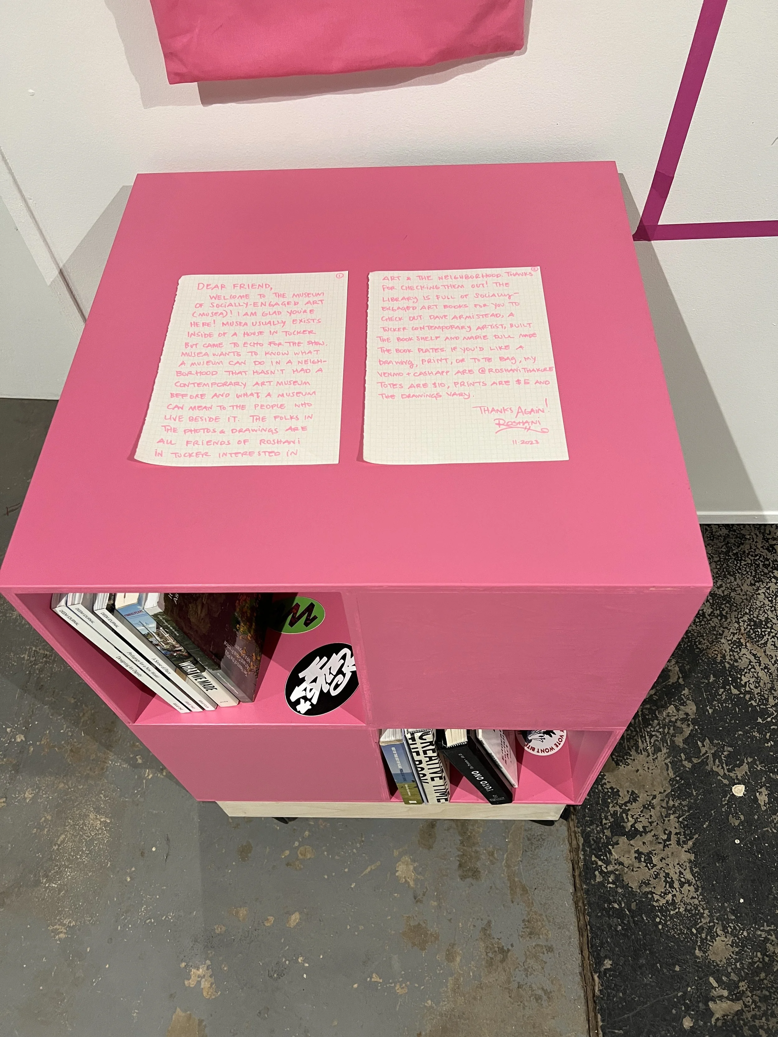   A letter to visitors about MuSEA and its library. Visitors are invited to read the books while they view the exhibition.   