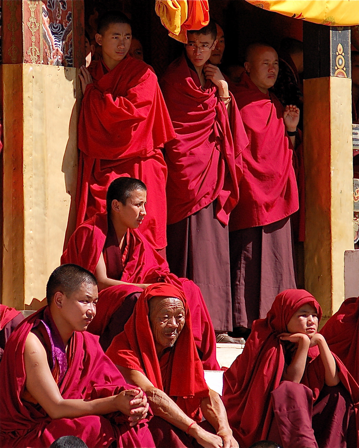 Monks Watching Festival Performers, Bhutan