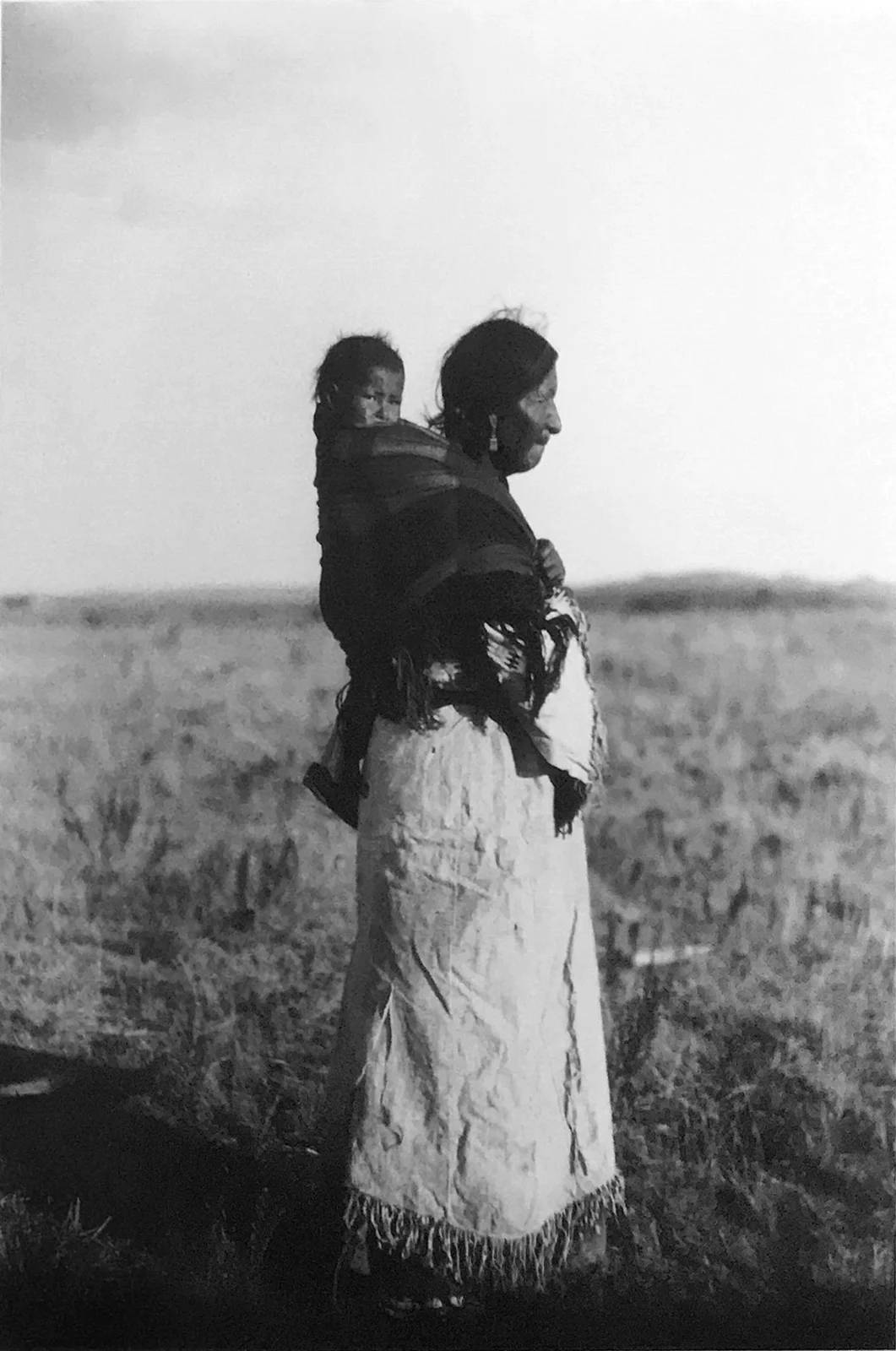 Postcard photograph: Lakota woman & child. The Lakota are matrilineal and children belong to the mother’s clan. Traditionally women controlled the food resources and movable property. Photo circa 1910 . nativenorthwest.com