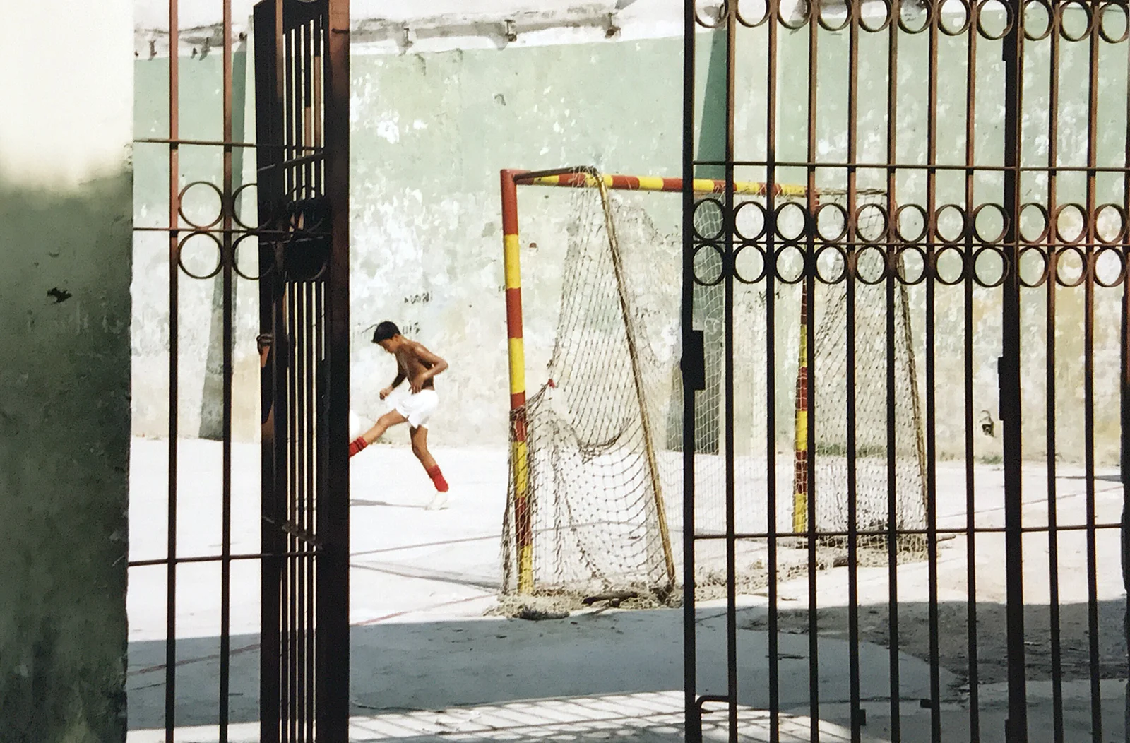 A lone footballer in Havana, Cuba 2000 © Tanya Clarke