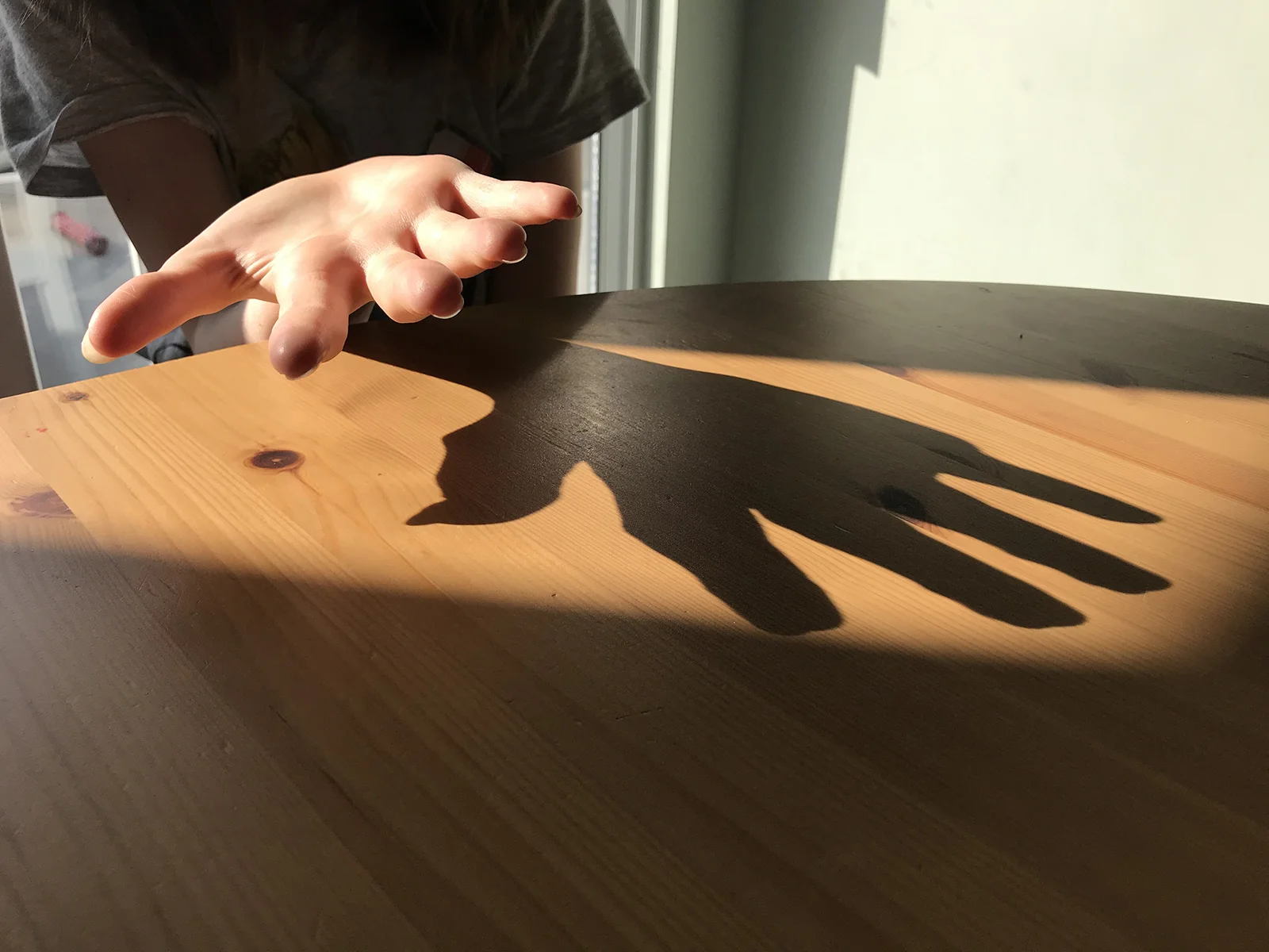 Hand shadow on table