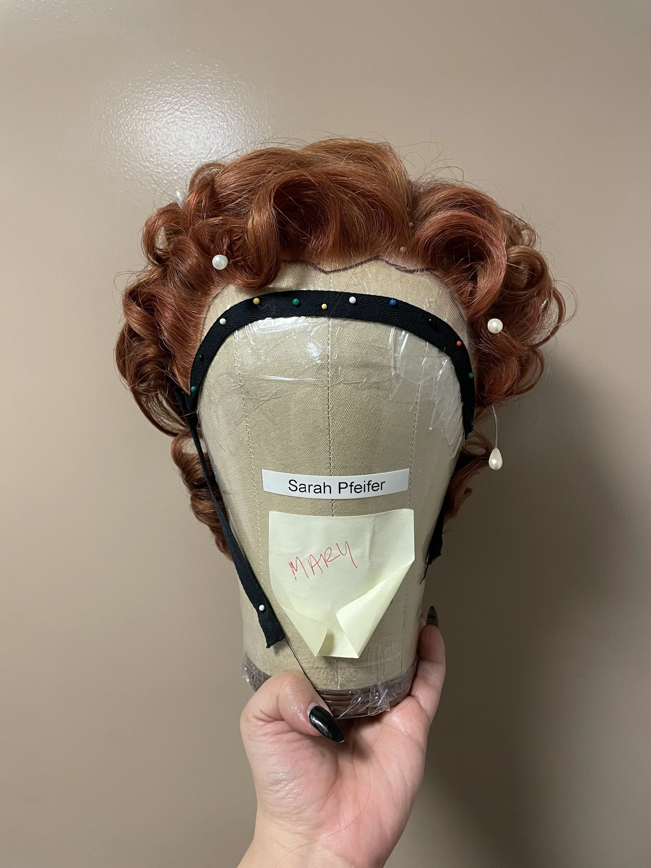  Process wig on head block, front 