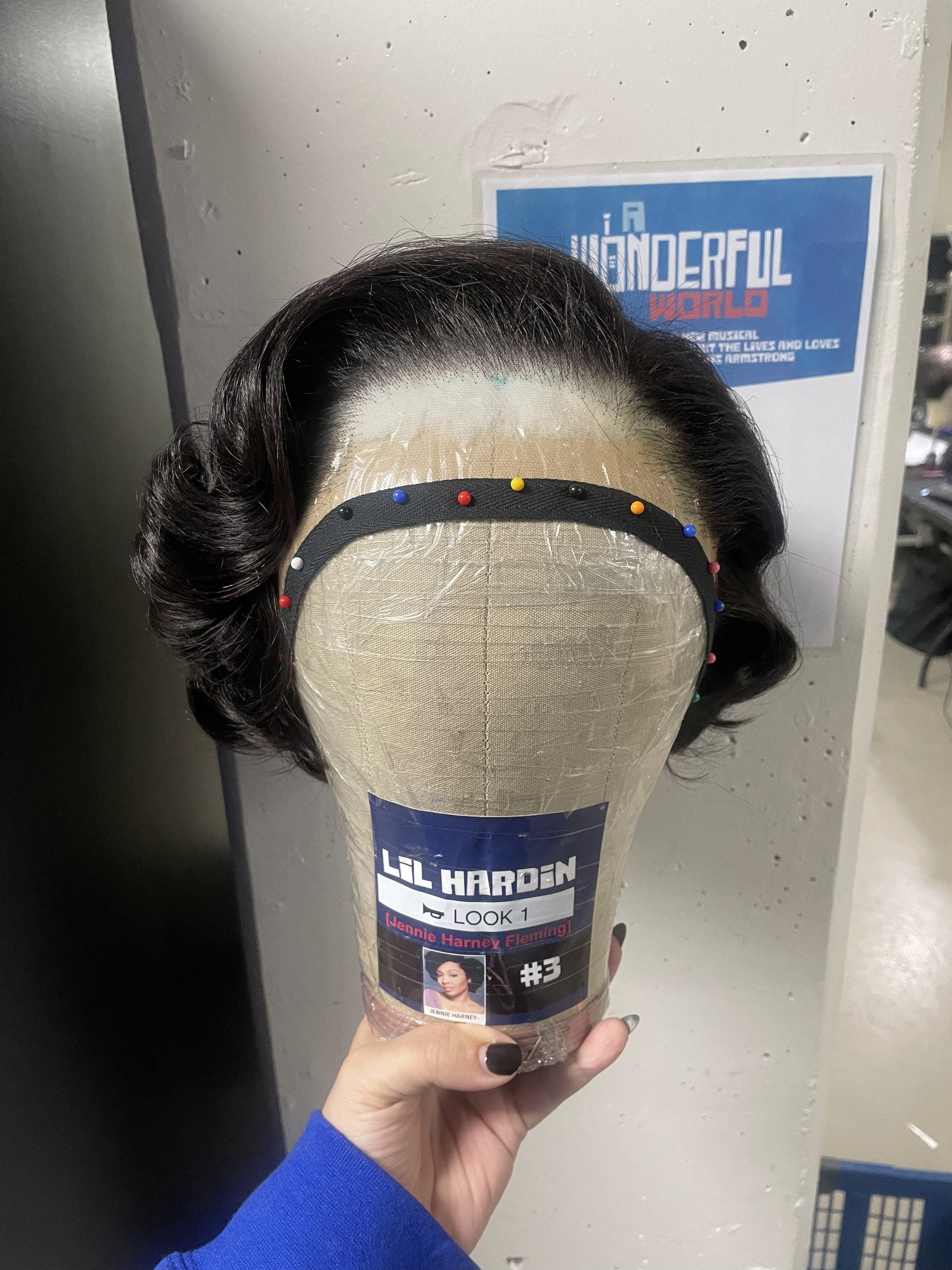  Finished wig on block, front 
