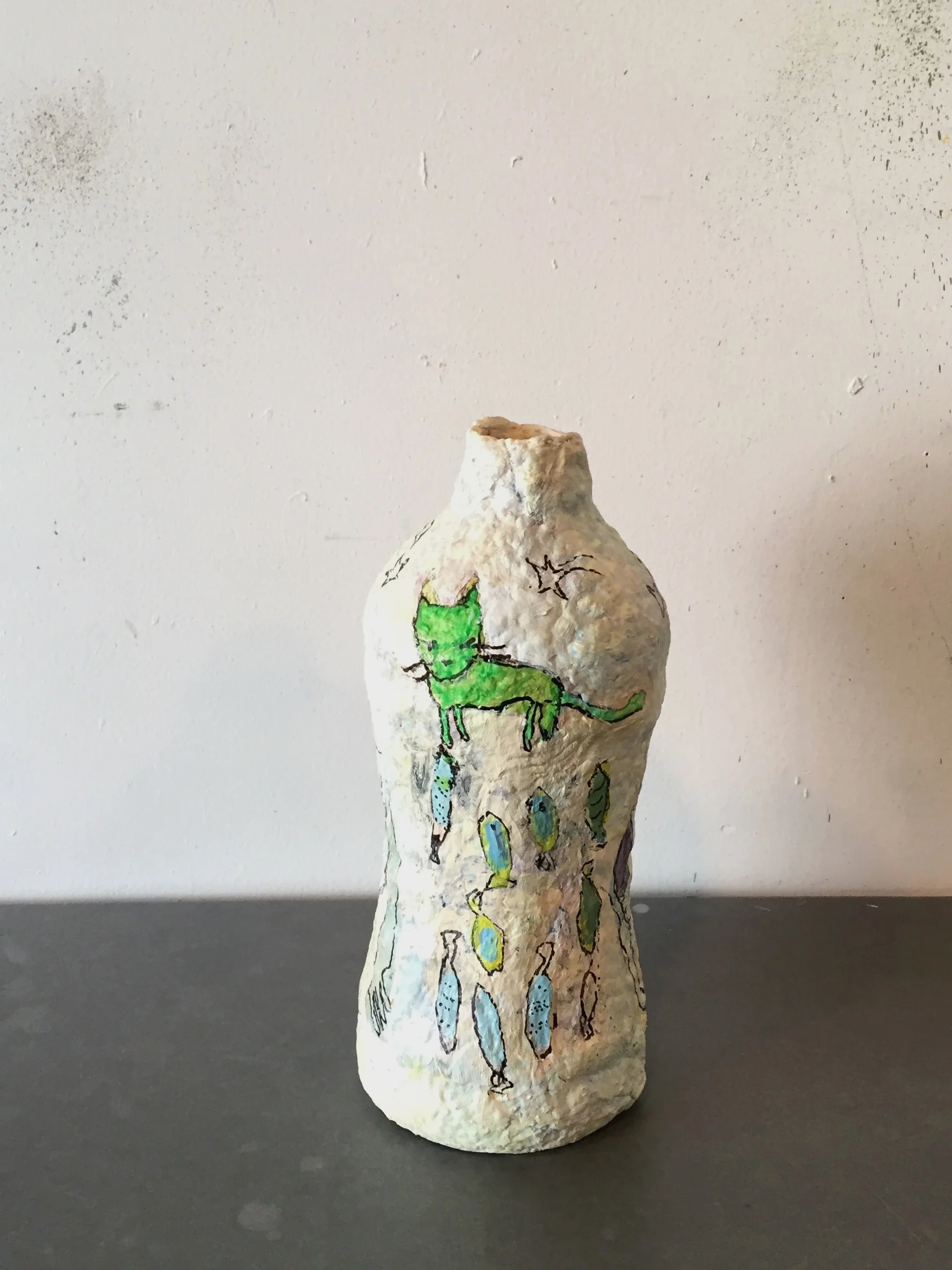 dream bottle (2 views) 2018 handmade paper wrapped around reclaimed plastic bottle, gouache, flashe and sharpie