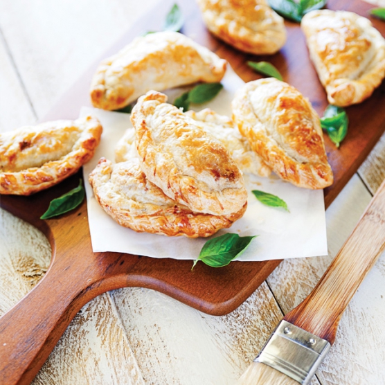 Mini chicken empanadas with three cheeses & spring onion
