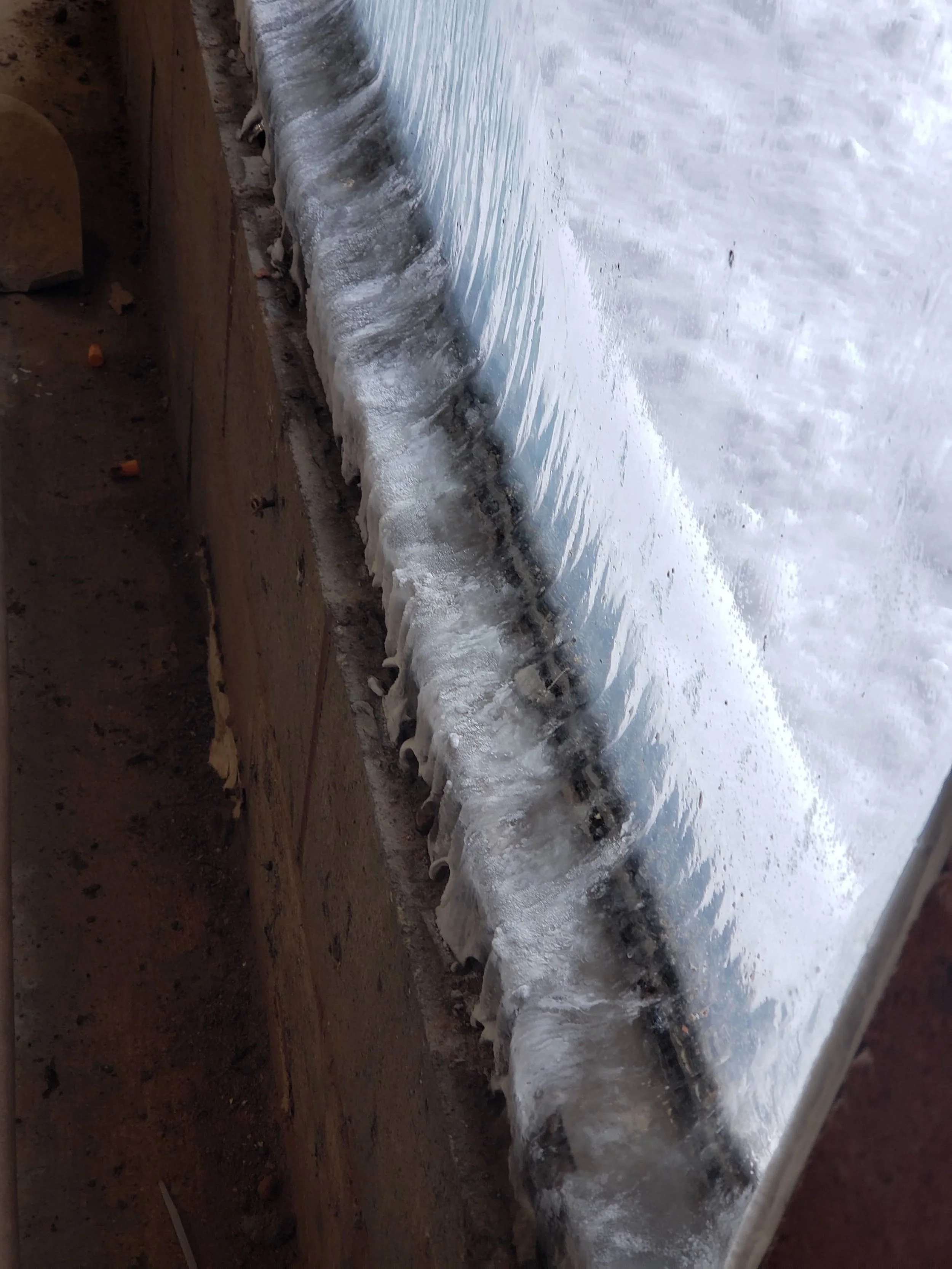 WOAH that was a cold night, another reason why these windows are being replaced! Frozen solid from the inside!