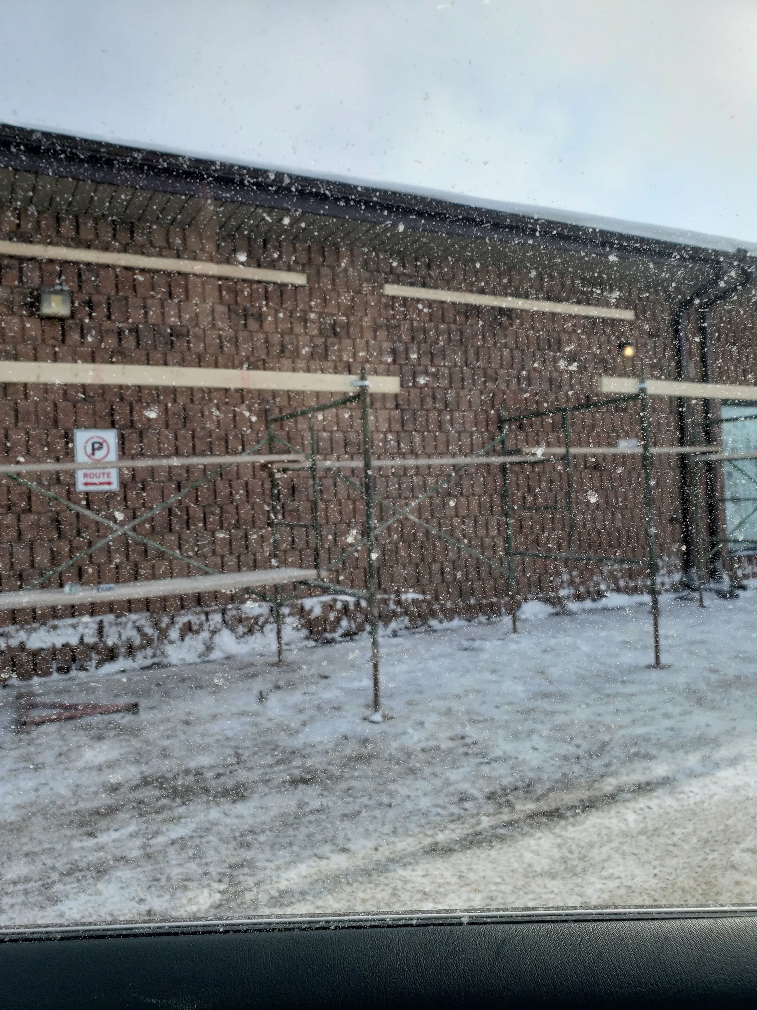 Scaffolding goes up for the exterior openings.