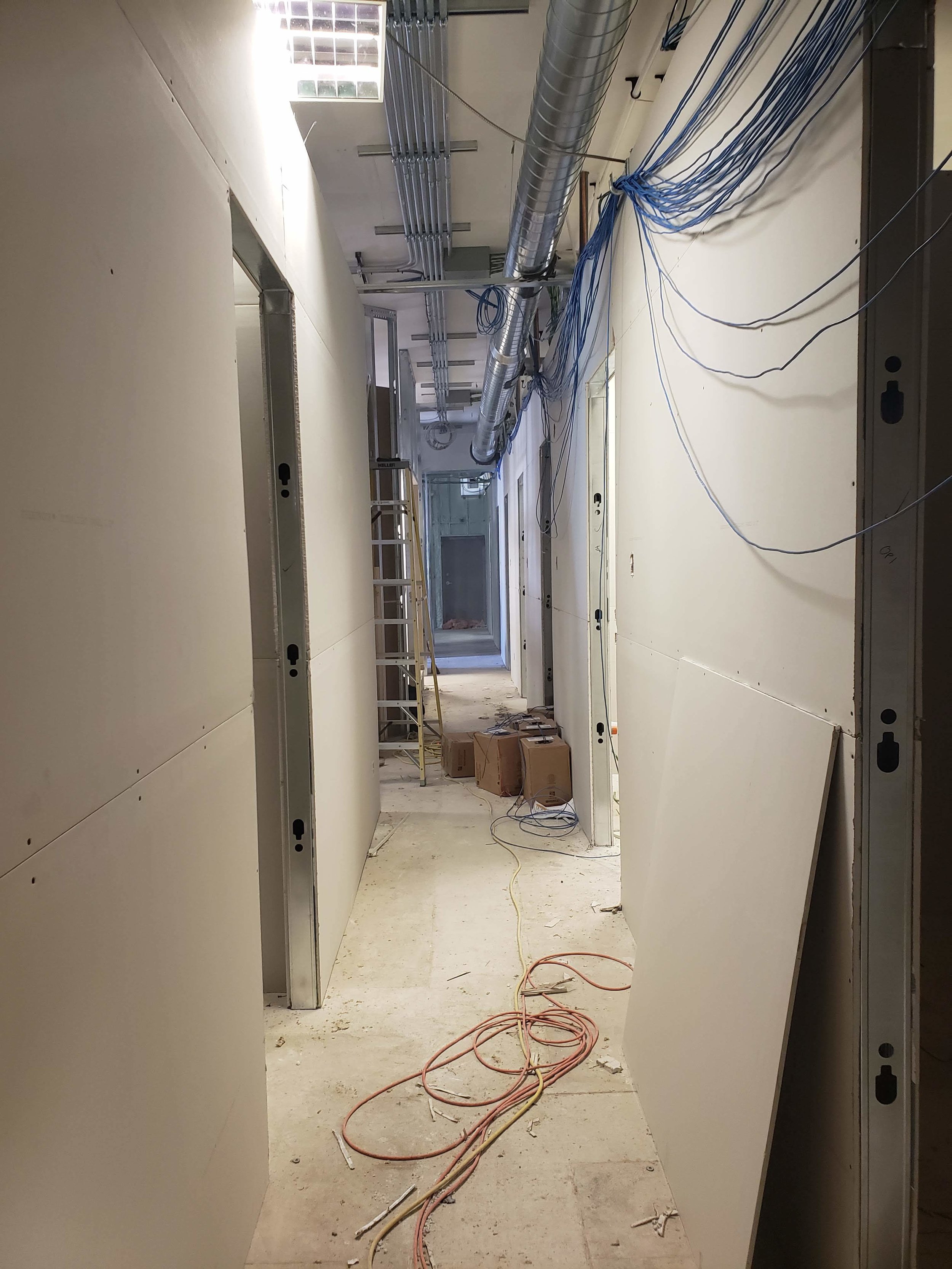 Drywall and data lines going in !