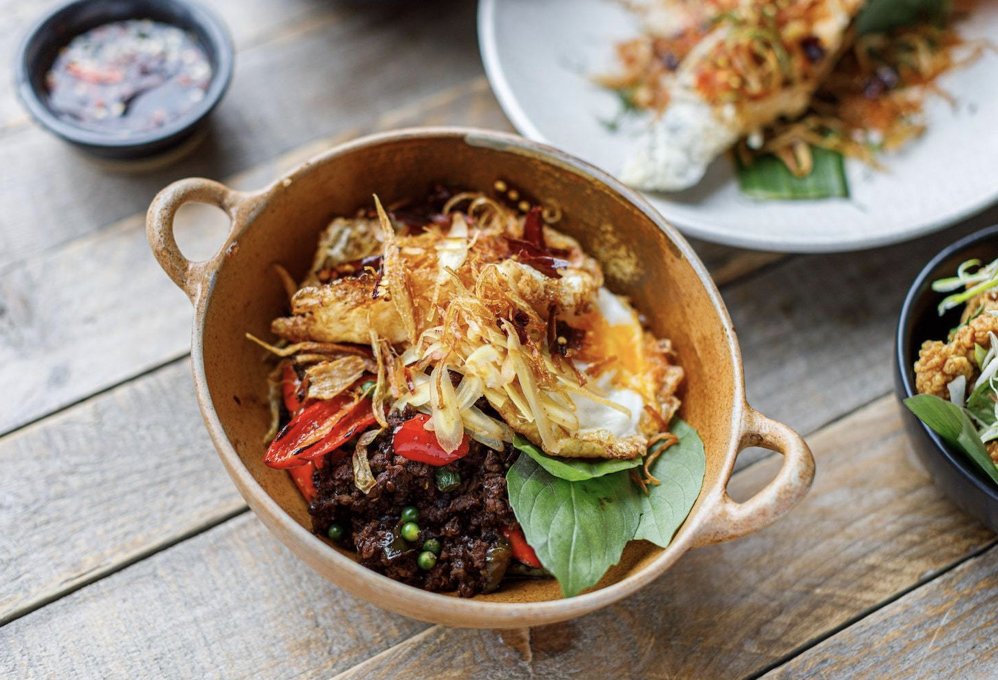 Kra Pao, stir-fried aged minced beef with chilli, garlic, white pepper, wild ginger, green peppercorns and holy basil. Topped with a runny wok-fried egg & crispy shallots