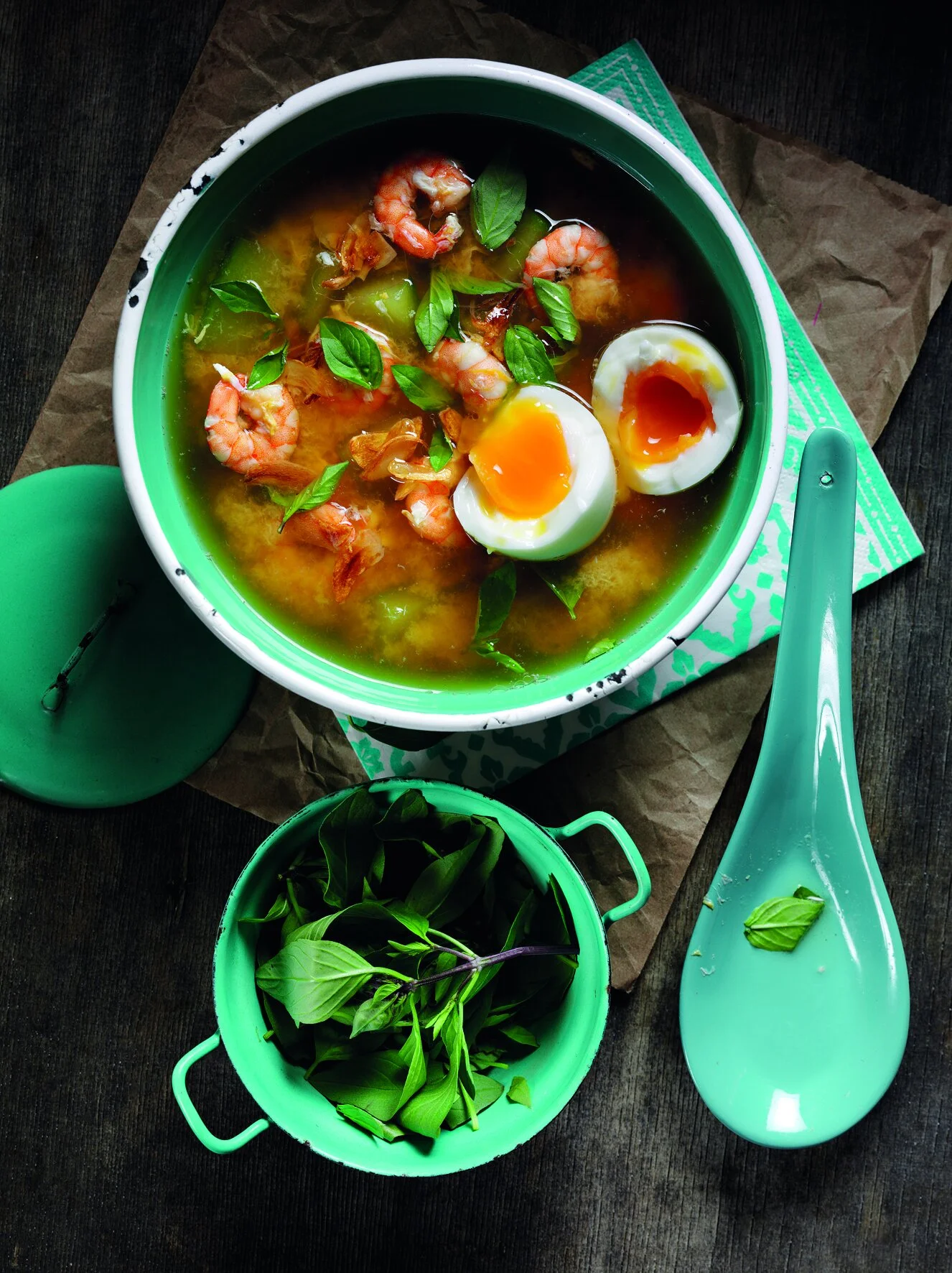 Thai prawn and shrimp floss soup with white pepper and runny eggs in a green enamel bowl, recipe by Sebby Holmes