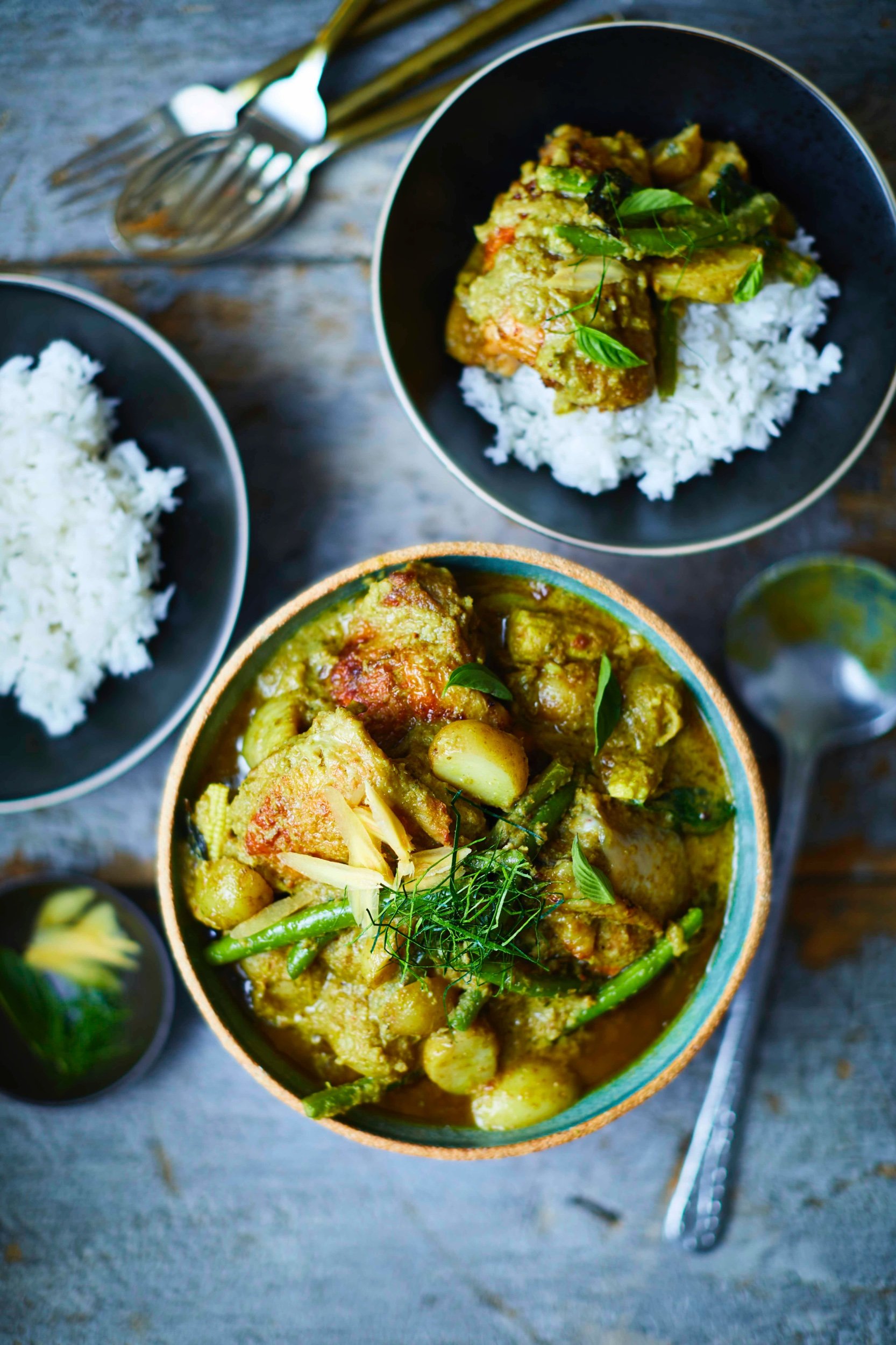Wood smoked BBQ chicken thighs in a vegetable green curry with krachai and Thai basil, recipe by Sebby Holmes