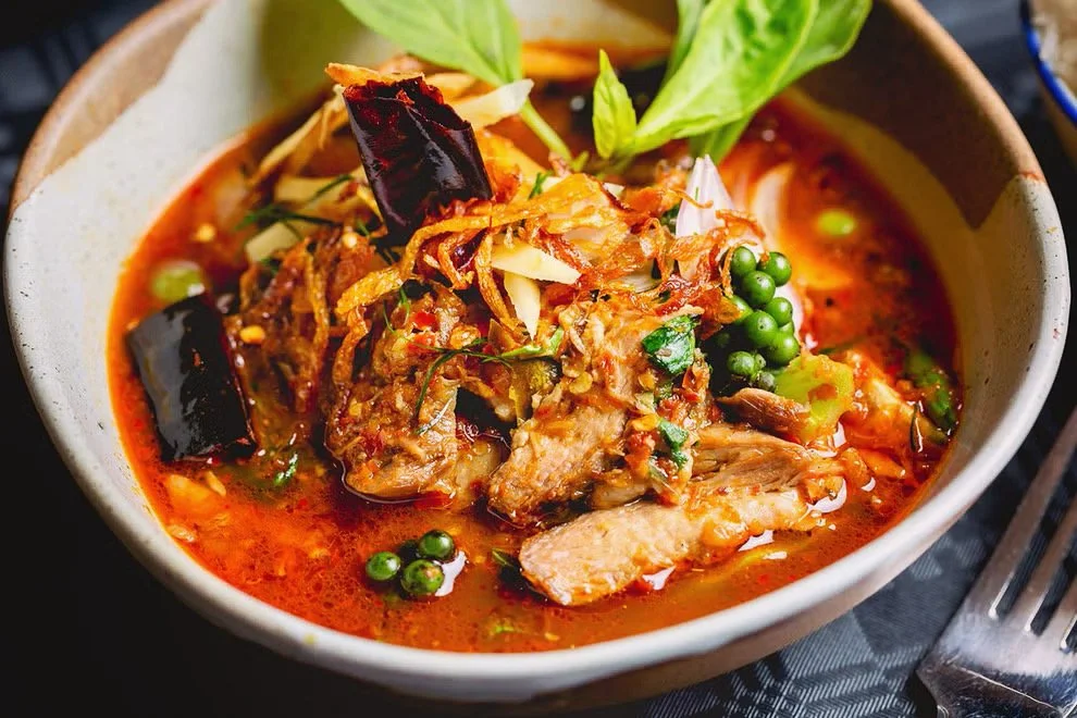 Braised beef cheek jungle curry with green peppercorns, fresh herbs and seasonal vegetables, recipe by Sebby Holmes