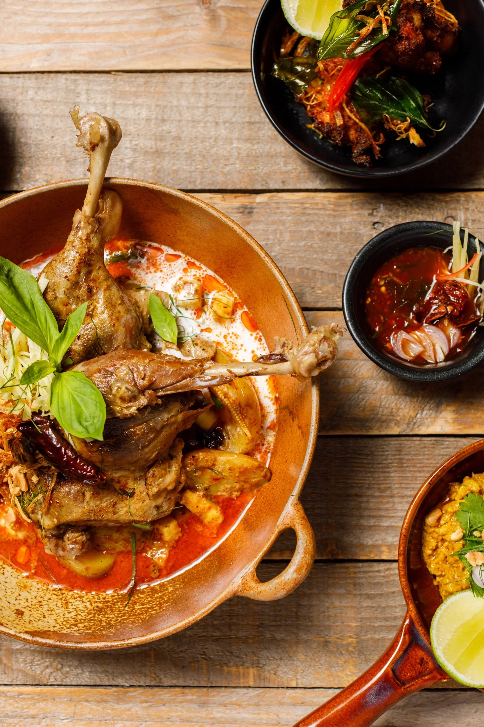 Braised Duck Leg Massaman with Roasted Pineapple, Sultanas and Salt Roasted Potatoes