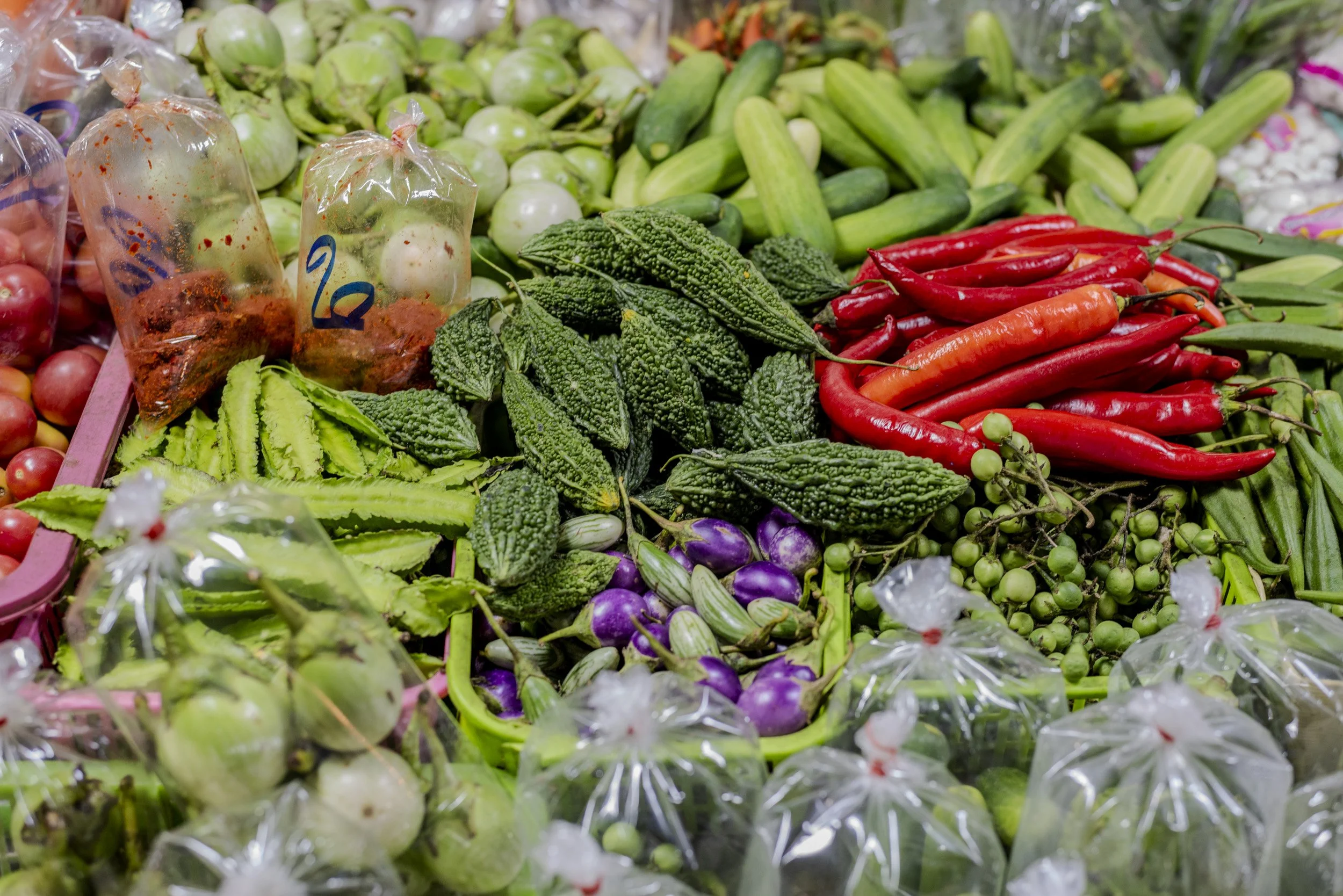 Fresh Thai vegetables and produce including pea aubergines, green chillies and herbs, sourced for Farang London by Sebby Holmes