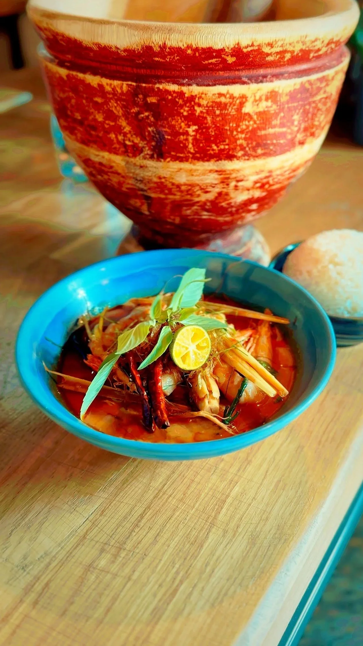 Tom Kha Goong Coconut and galangal soup with tiger prawns and smoked haddock